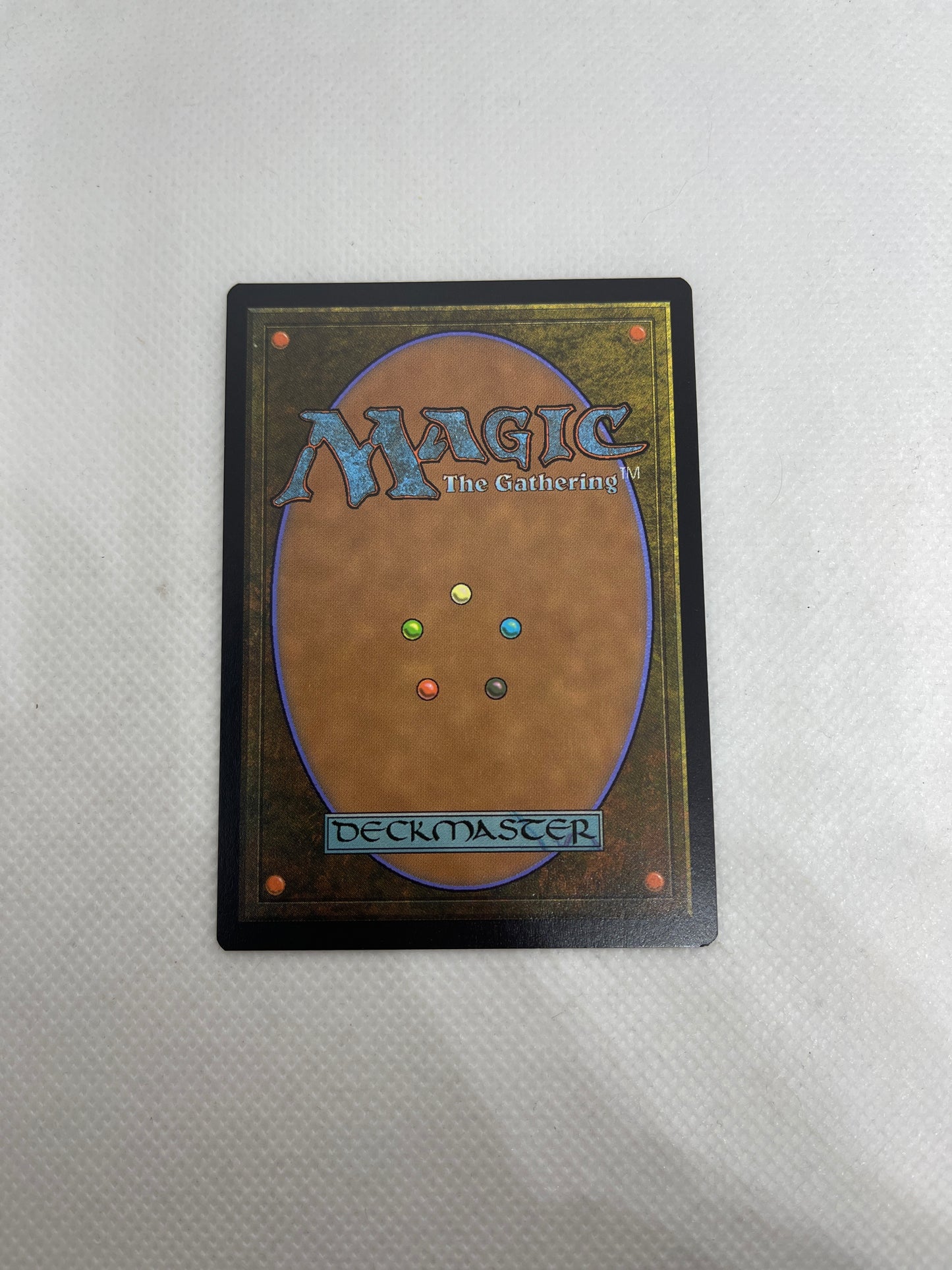 Trading card with 'Magic: The Gathering' branding on a textured surface