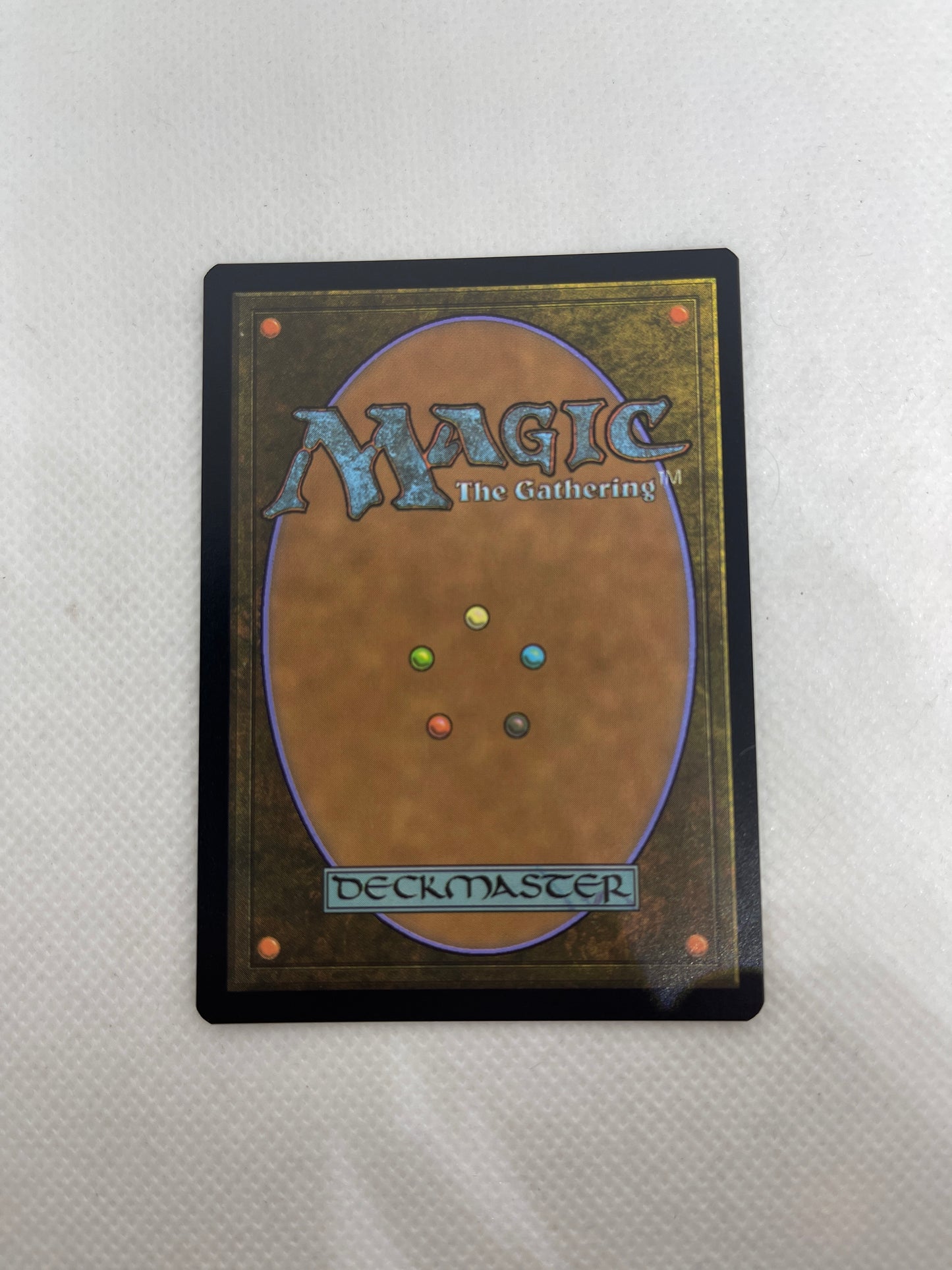 Trading card with 'Magic: The Gathering' branding on a textured white background