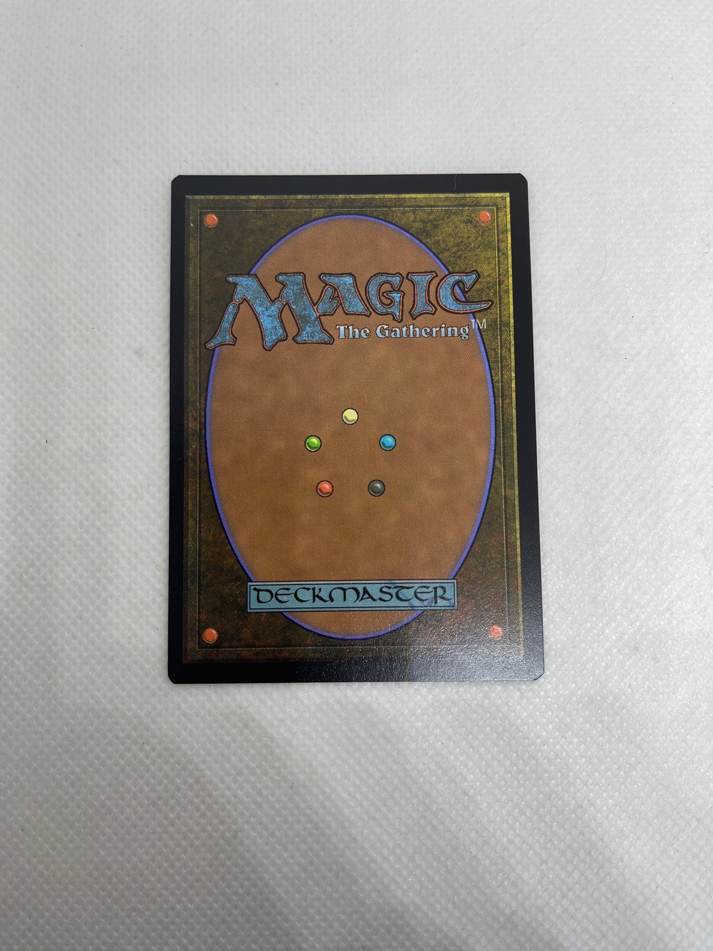 Card with 'Magic: The Gathering' branding on a gray background