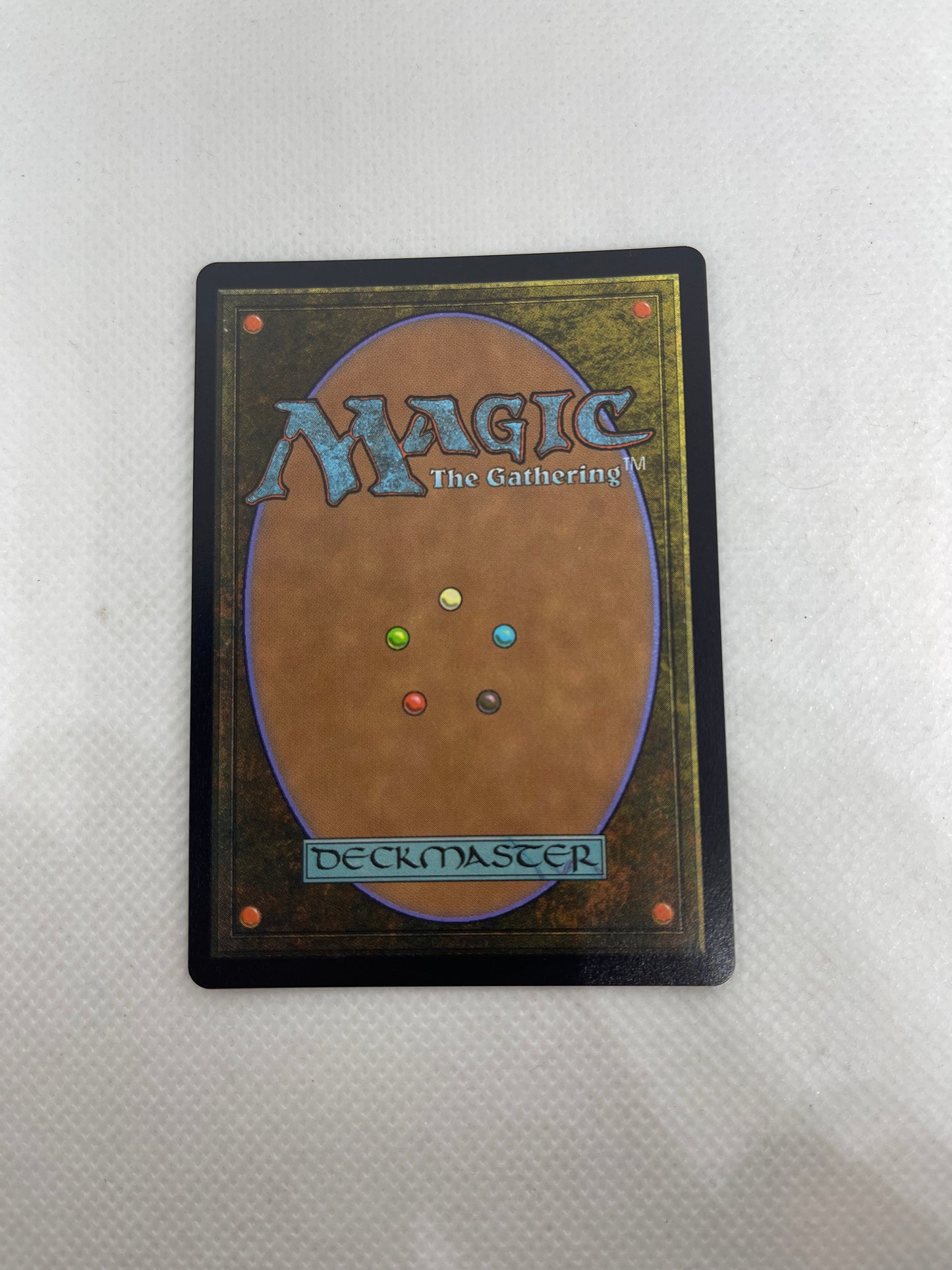 Trading card from 'Magic: The Gathering' on a textured white surface