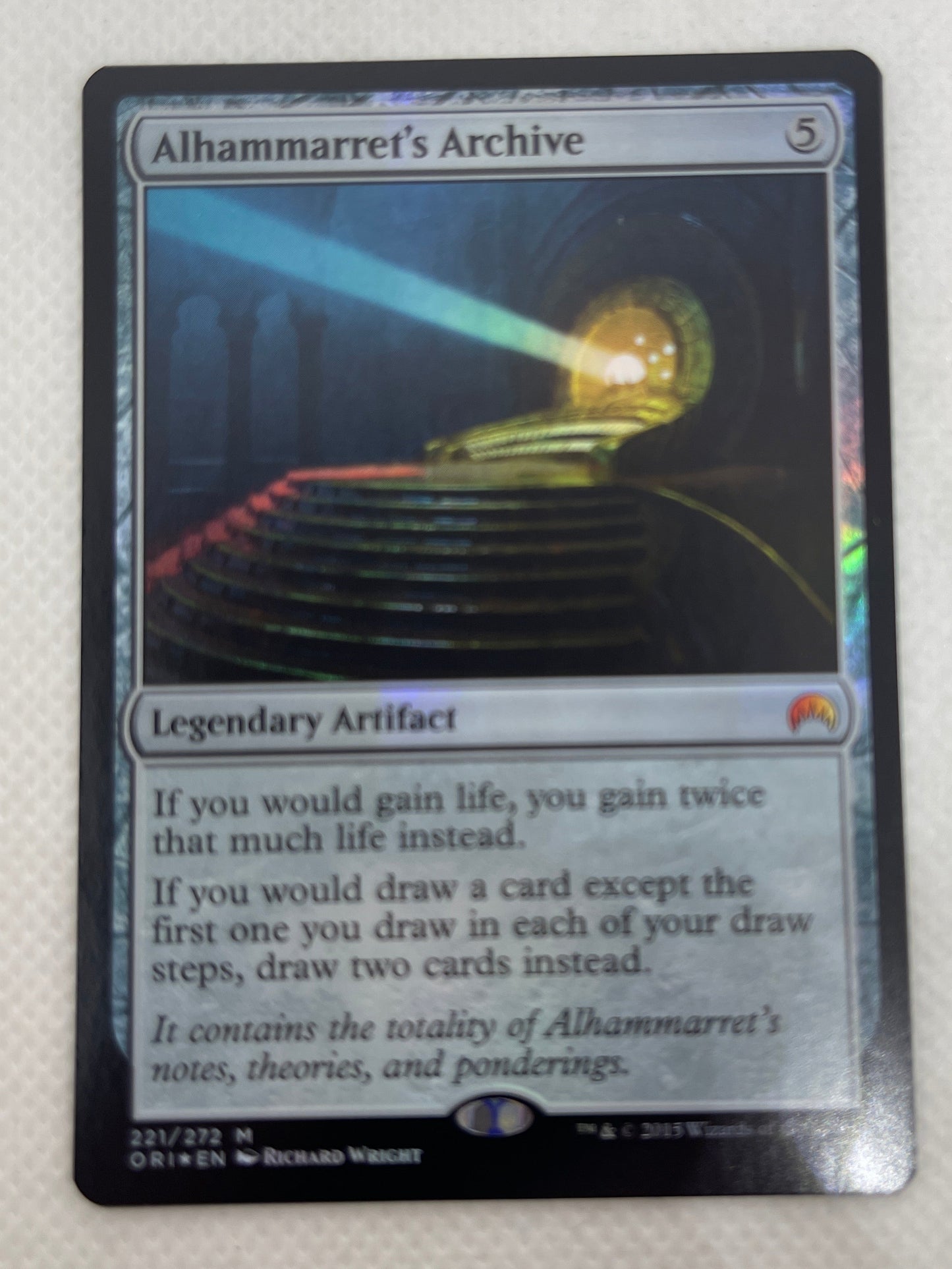 Trading card with detailed artwork and text on a textured surface