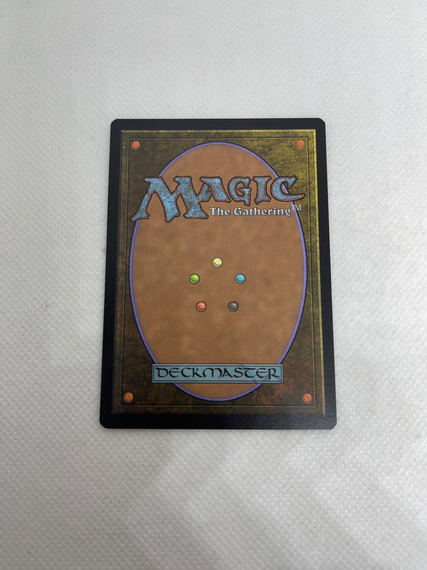 Trading card from 'Magic: The Gathering' on a textured gray background