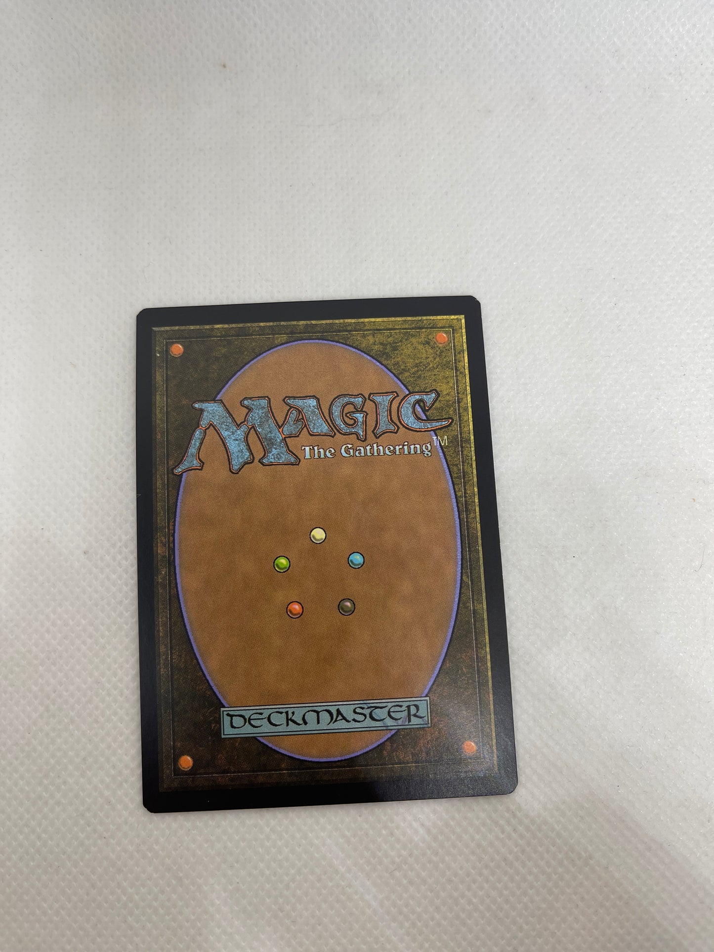 Trading card with 'Magic: The Gathering' branding on a light gray background