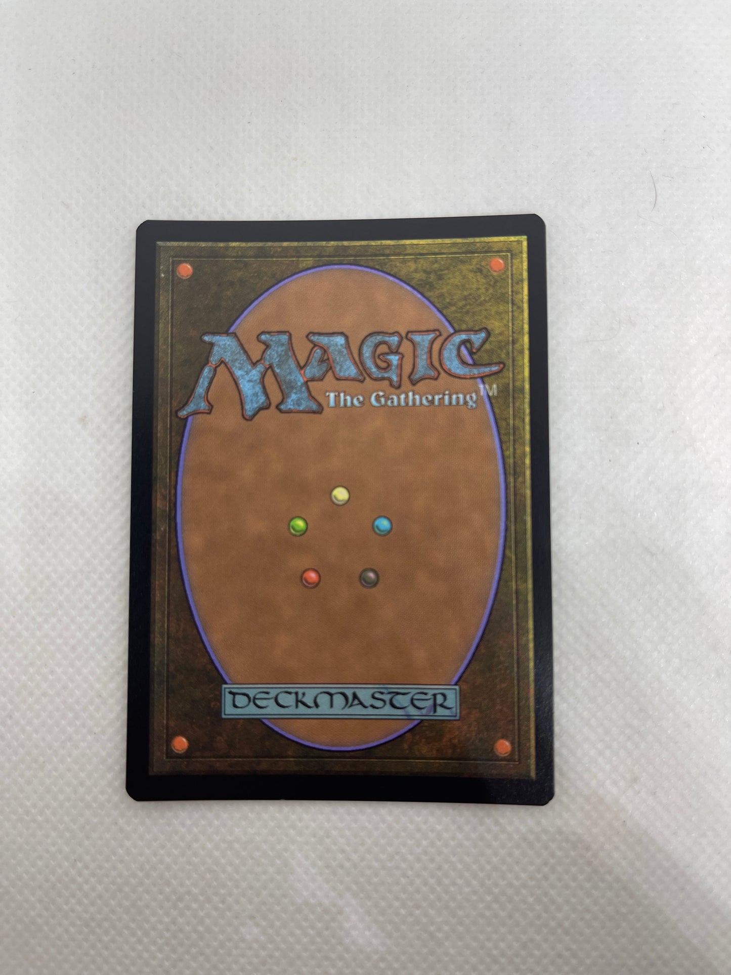 Trading card with 'Magic: The Gathering' branding on a textured surface