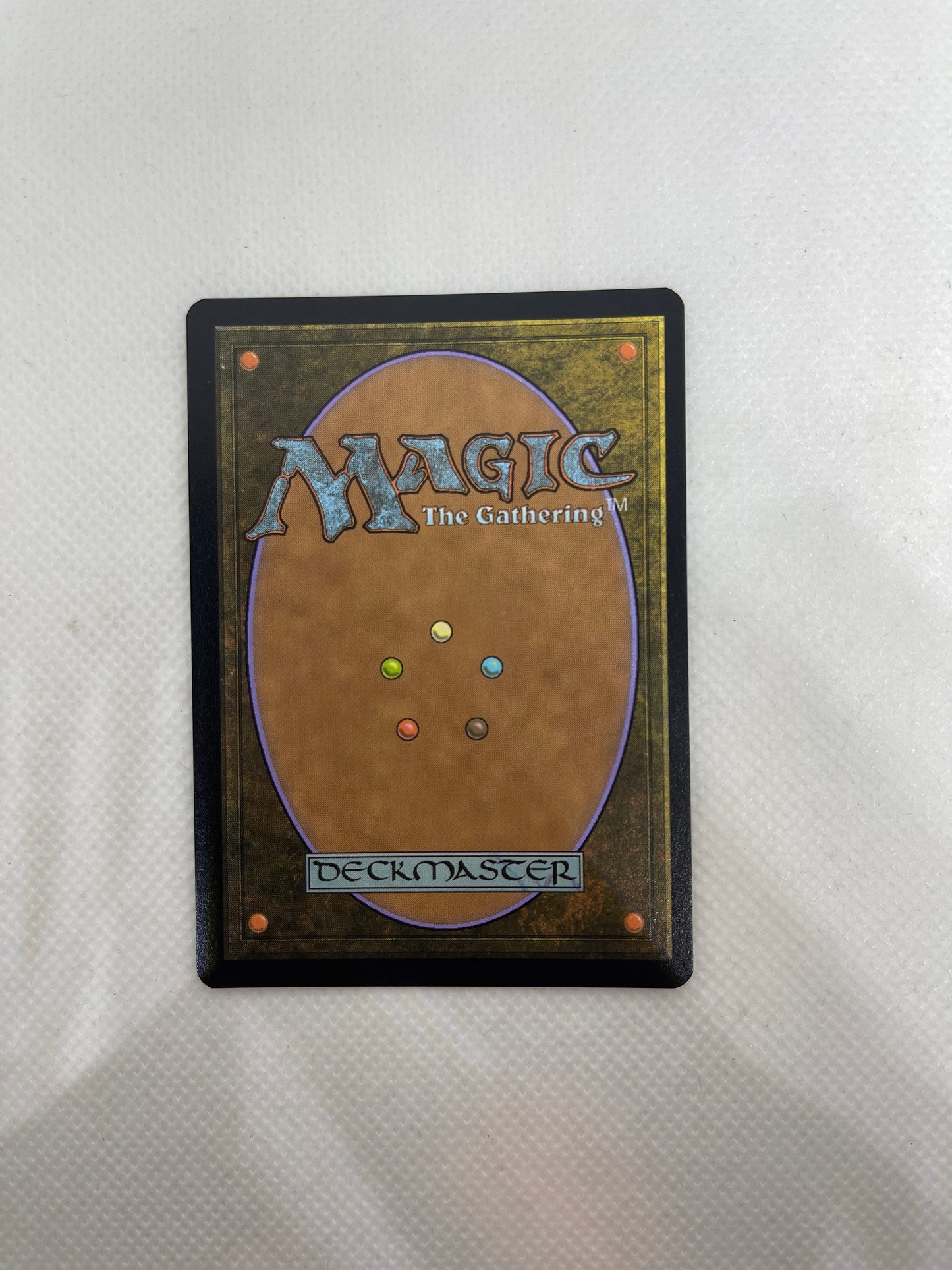 Card from 'Magic: The Gathering' on a textured surface
