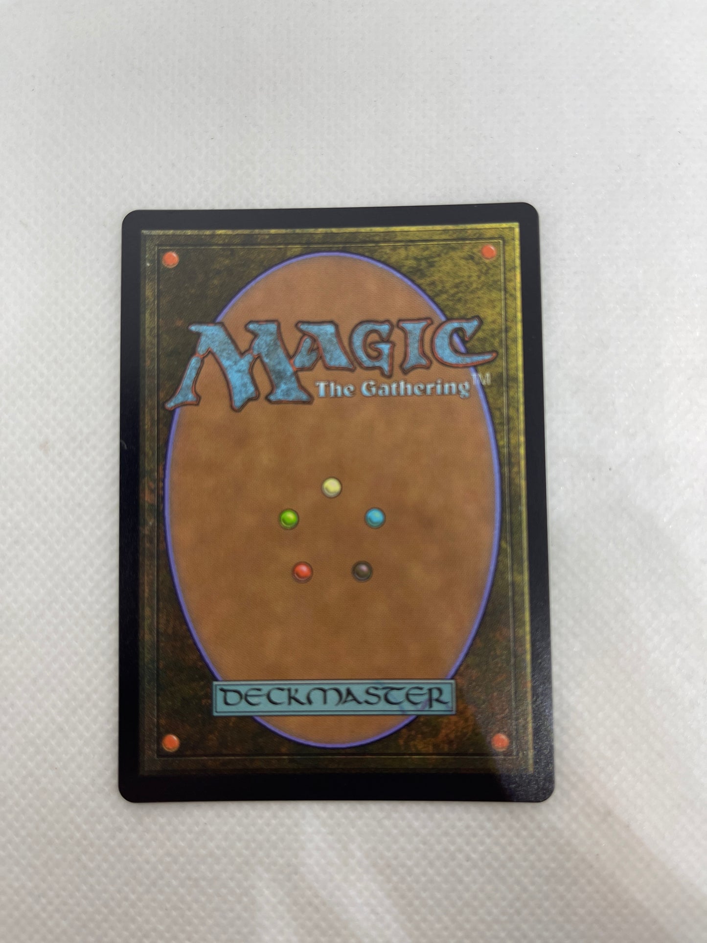 Trading card from 'Magic: The Gathering' on a textured white surface