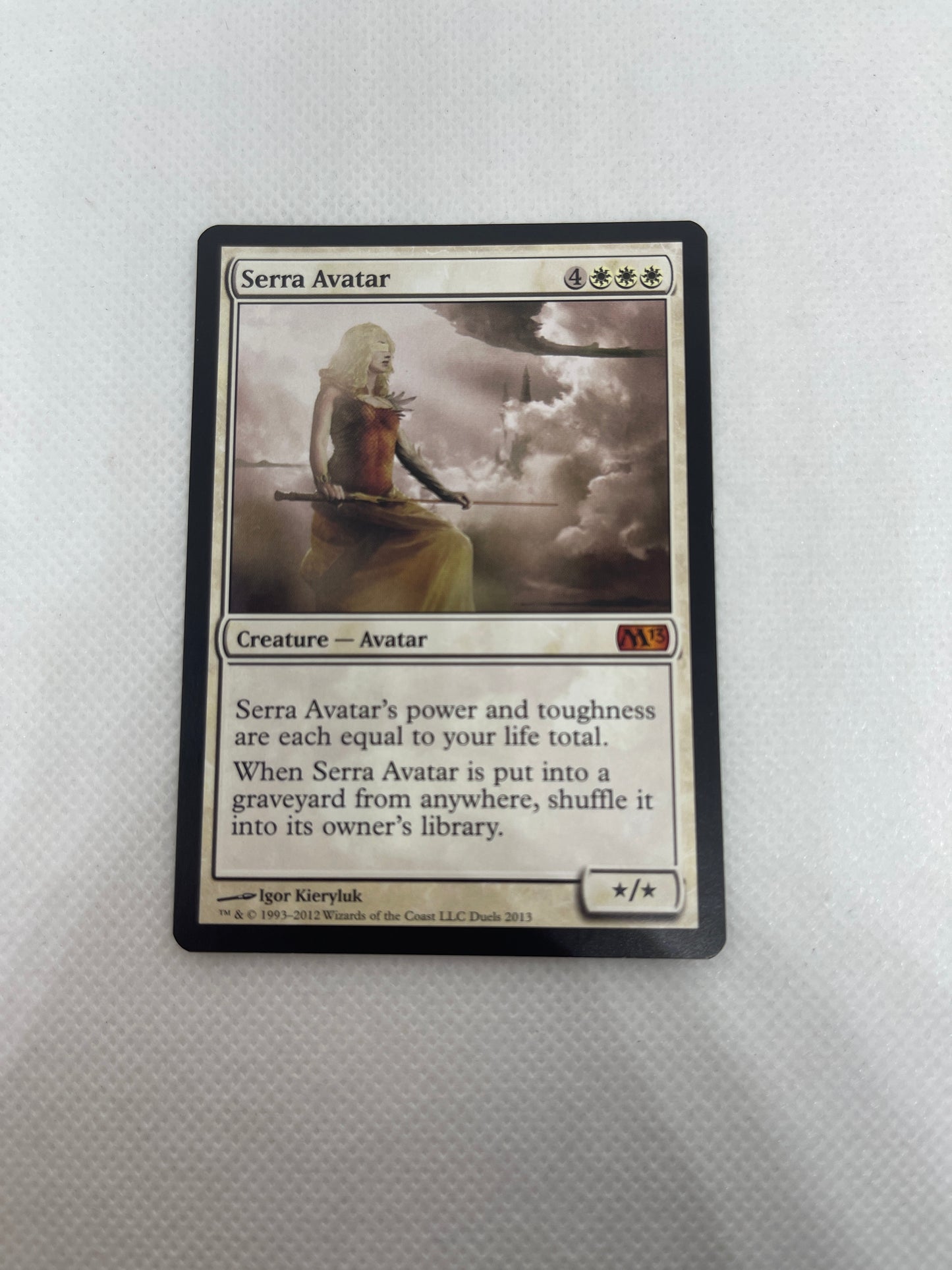 Trading card with artwork and text on a white background