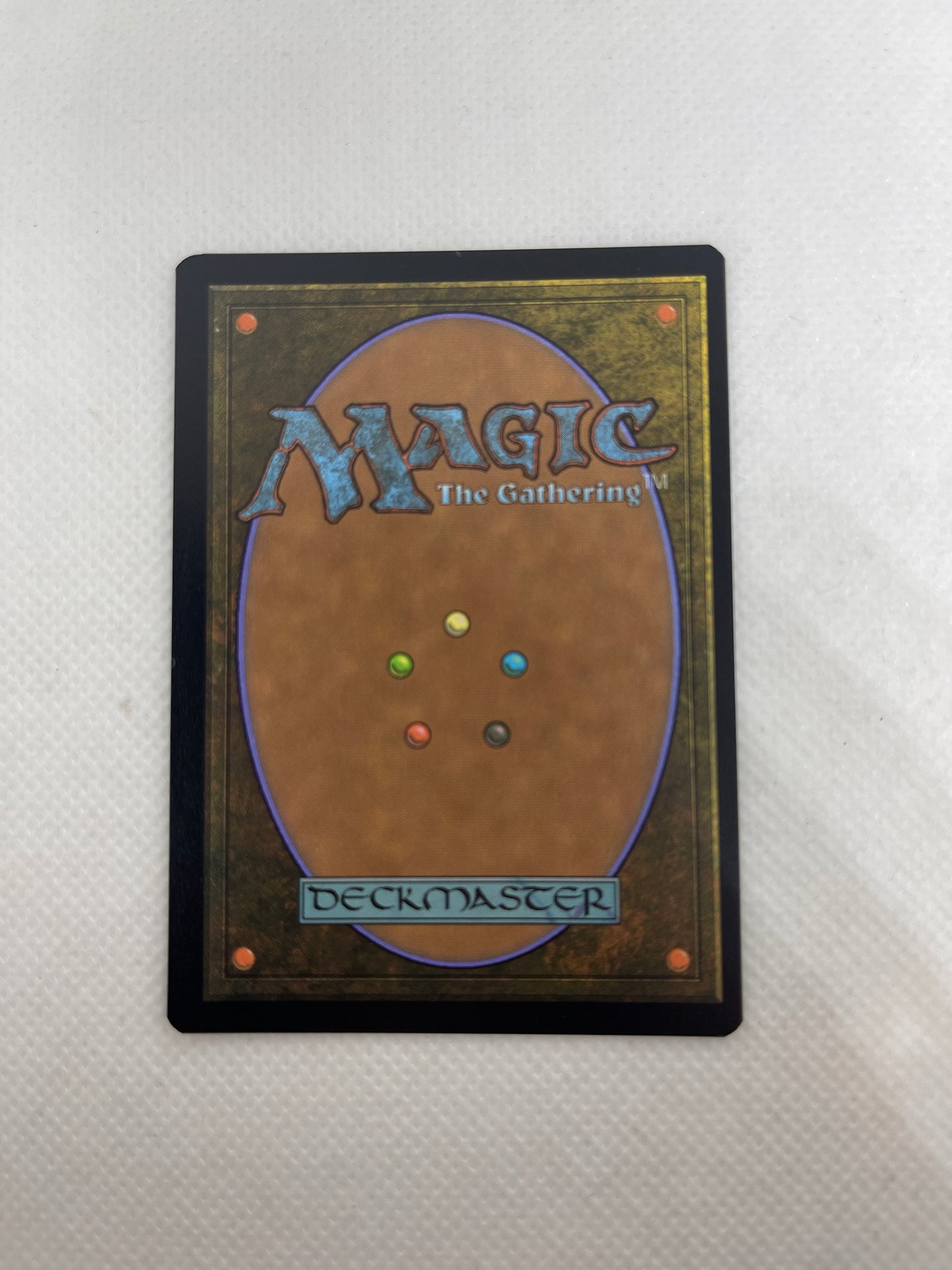 Card from 'Magic: The Gathering' on a textured surface