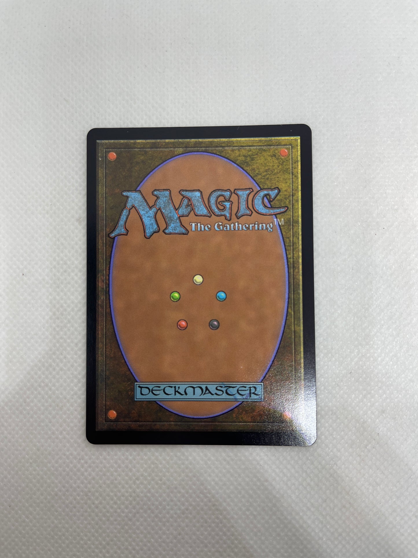 Trading card with 'Magic: The Gathering' branding on a textured surface