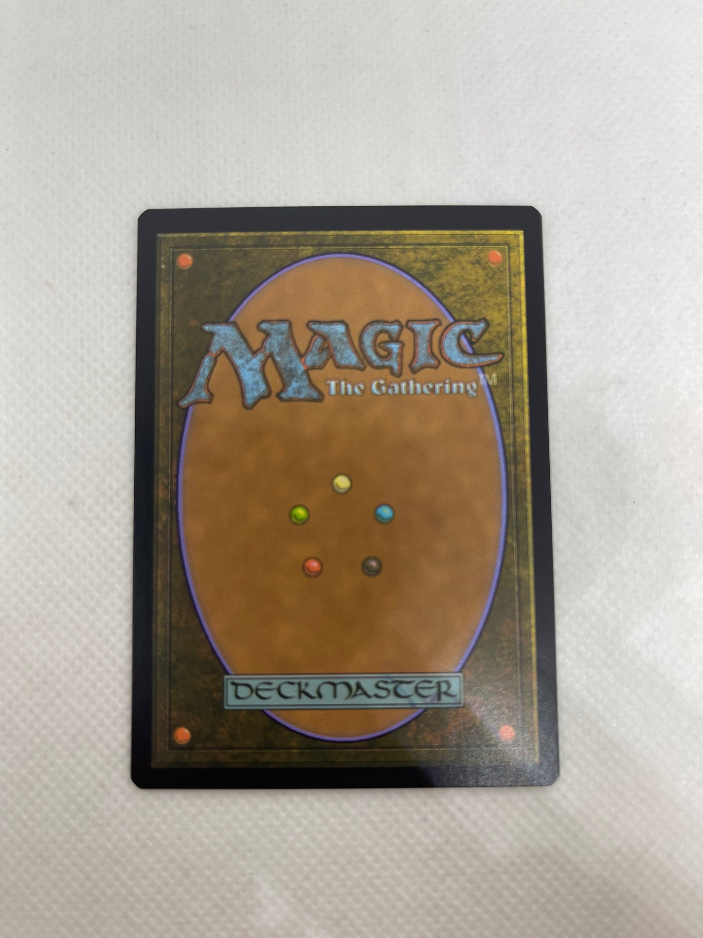 Trading card with 'Magic: The Gathering' branding on a textured surface