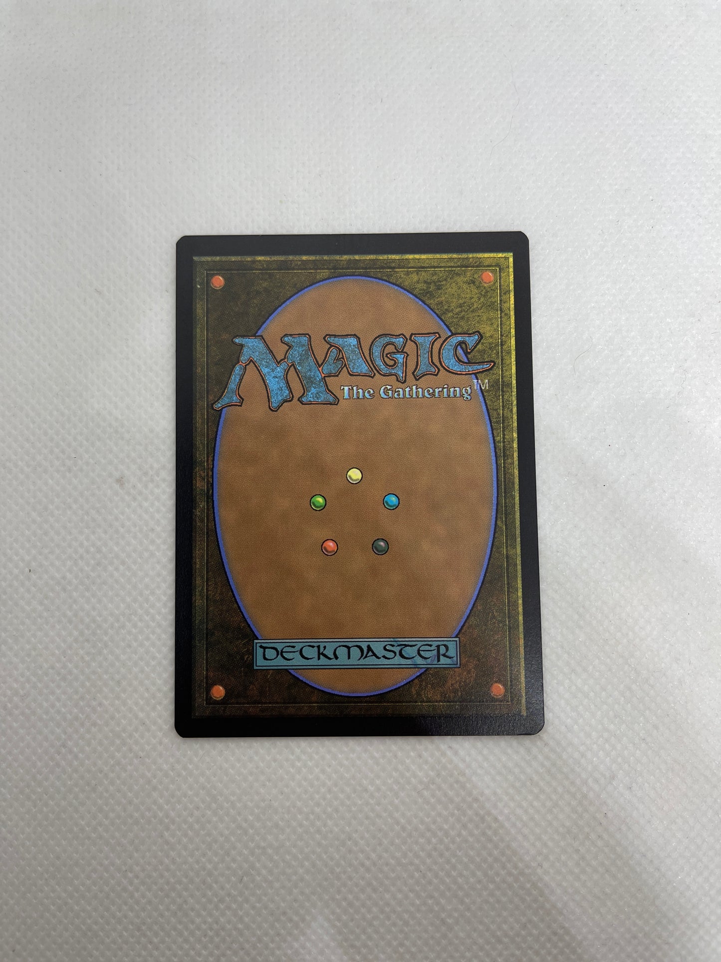 Trading card with 'Magic: The Gathering' branding on a textured surface