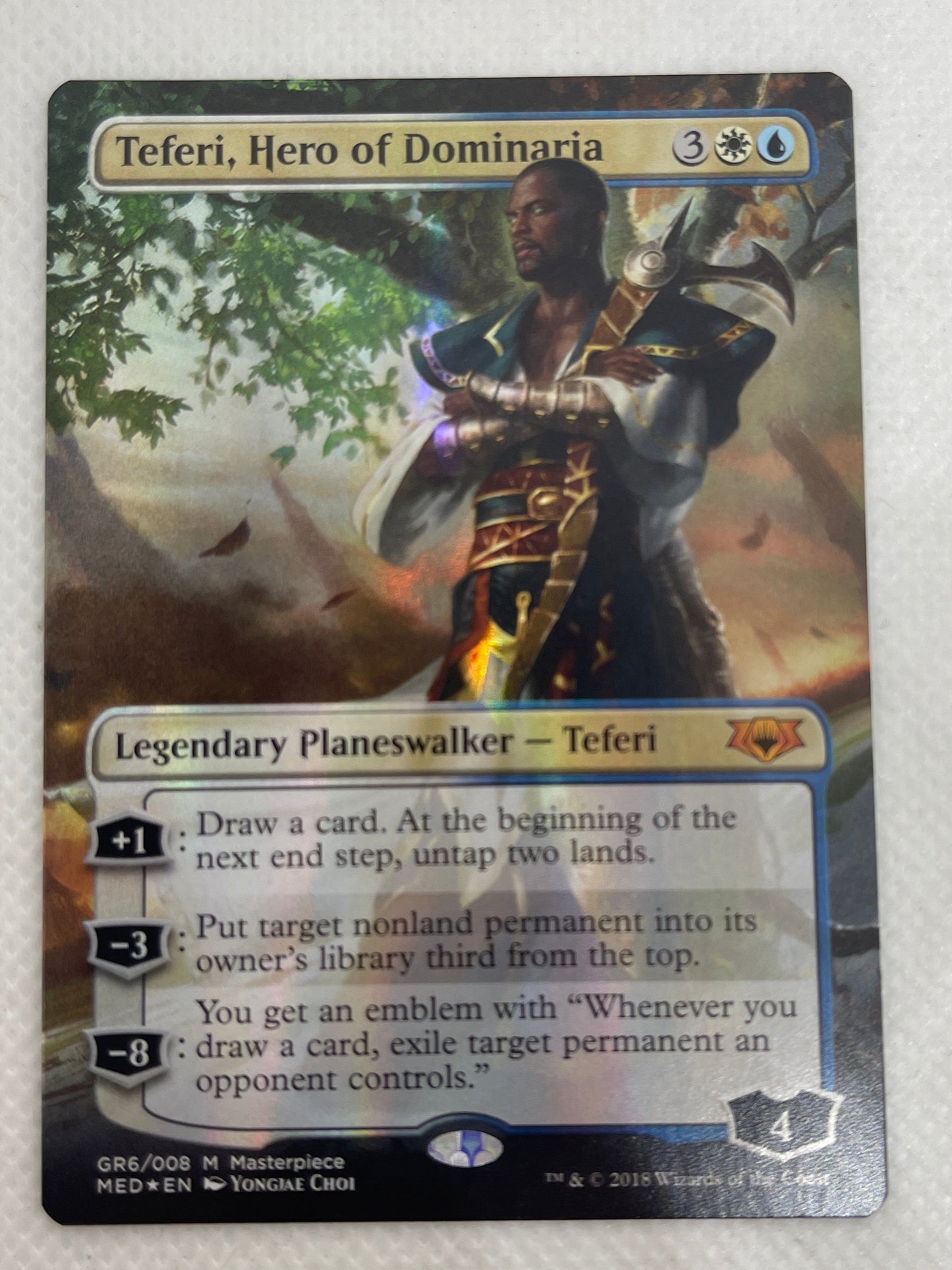 Trading card featuring a character with armor and weapon on a white background