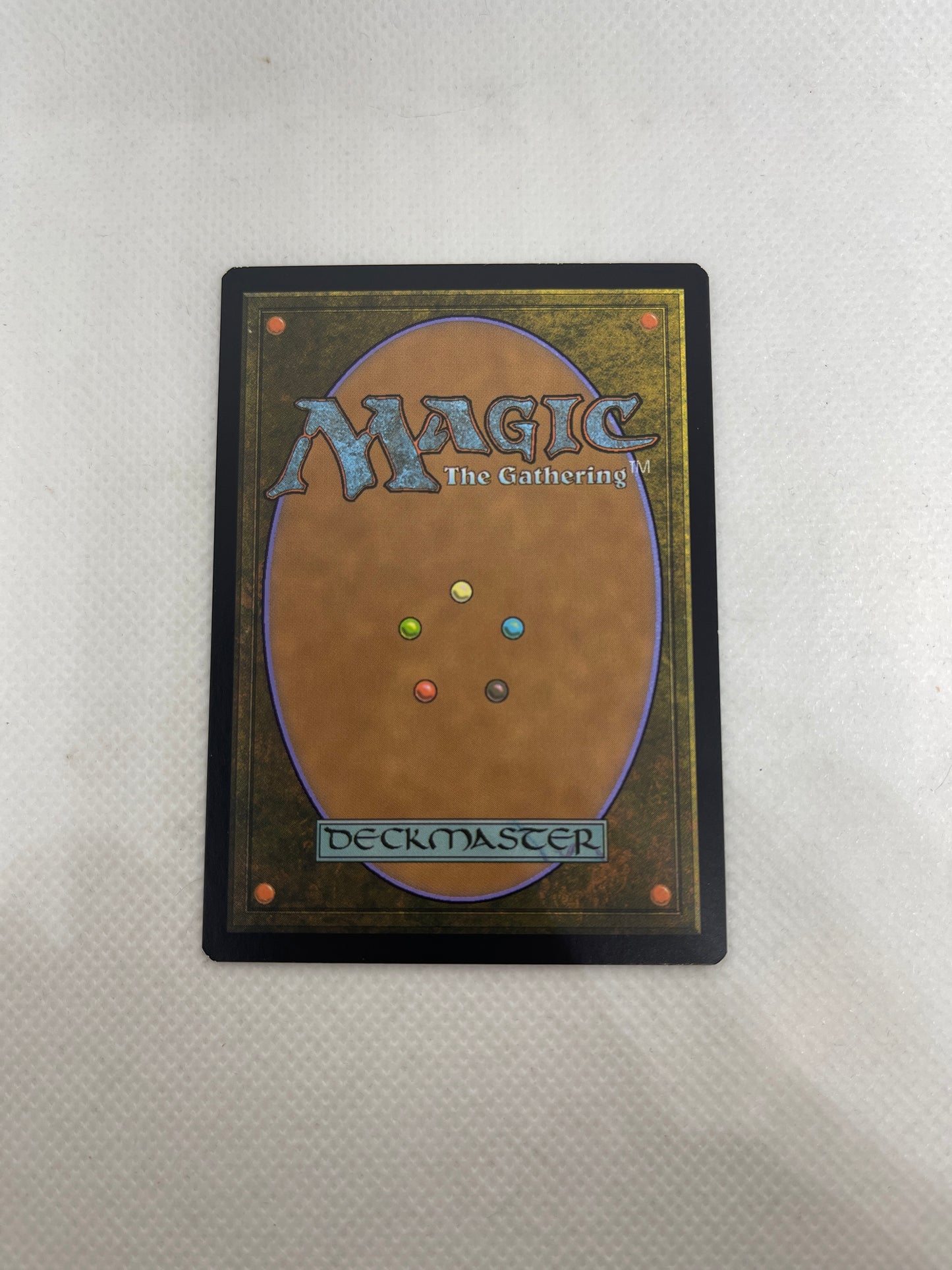 Trading card with 'Magic: The Gathering' branding on a textured surface