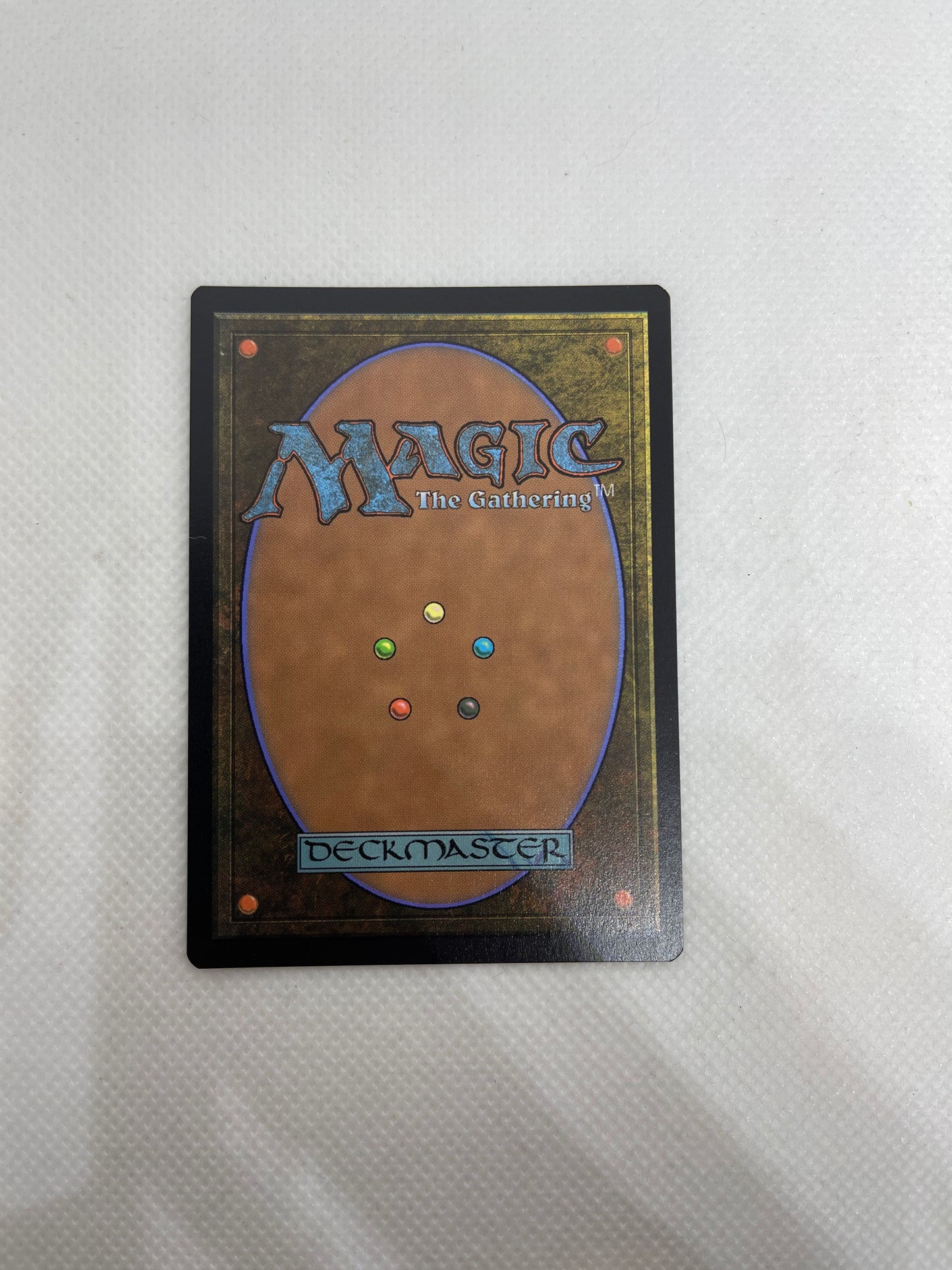 Trading card with 'Magic: The Gathering' branding on a textured surface