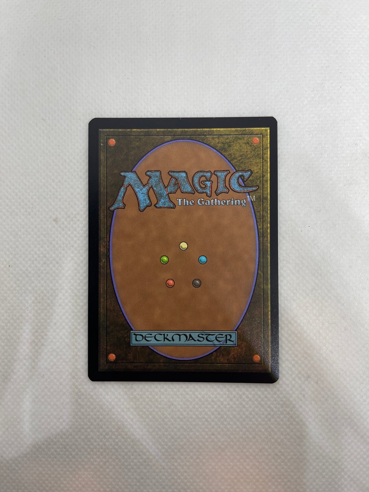 Trading card from 'Magic: The Gathering' on a textured white surface