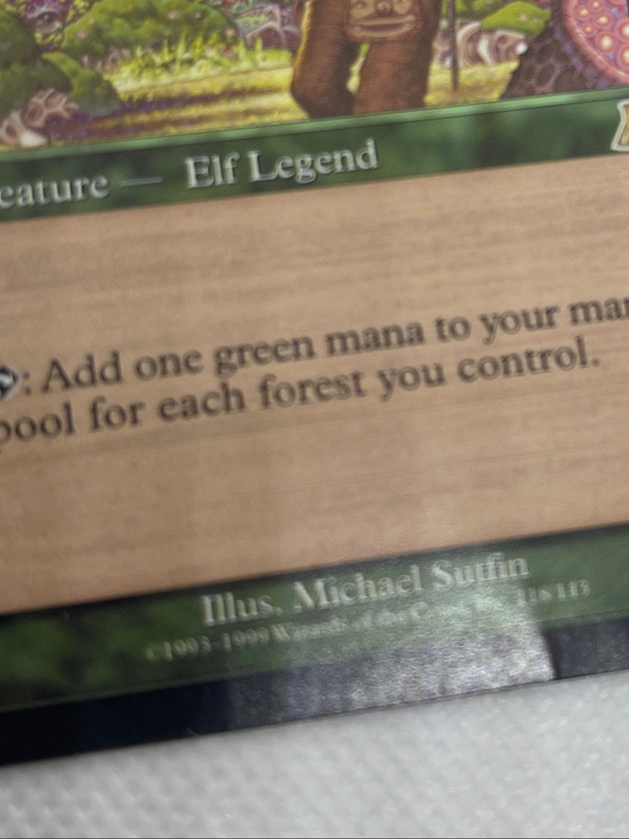 Card with artwork and text on a white background