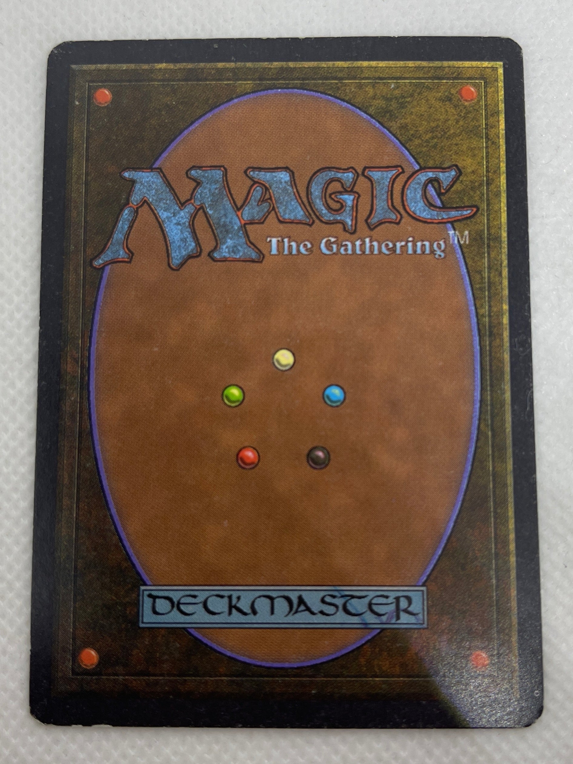 Trading card from 'Magic: The Gathering' on a textured white background
