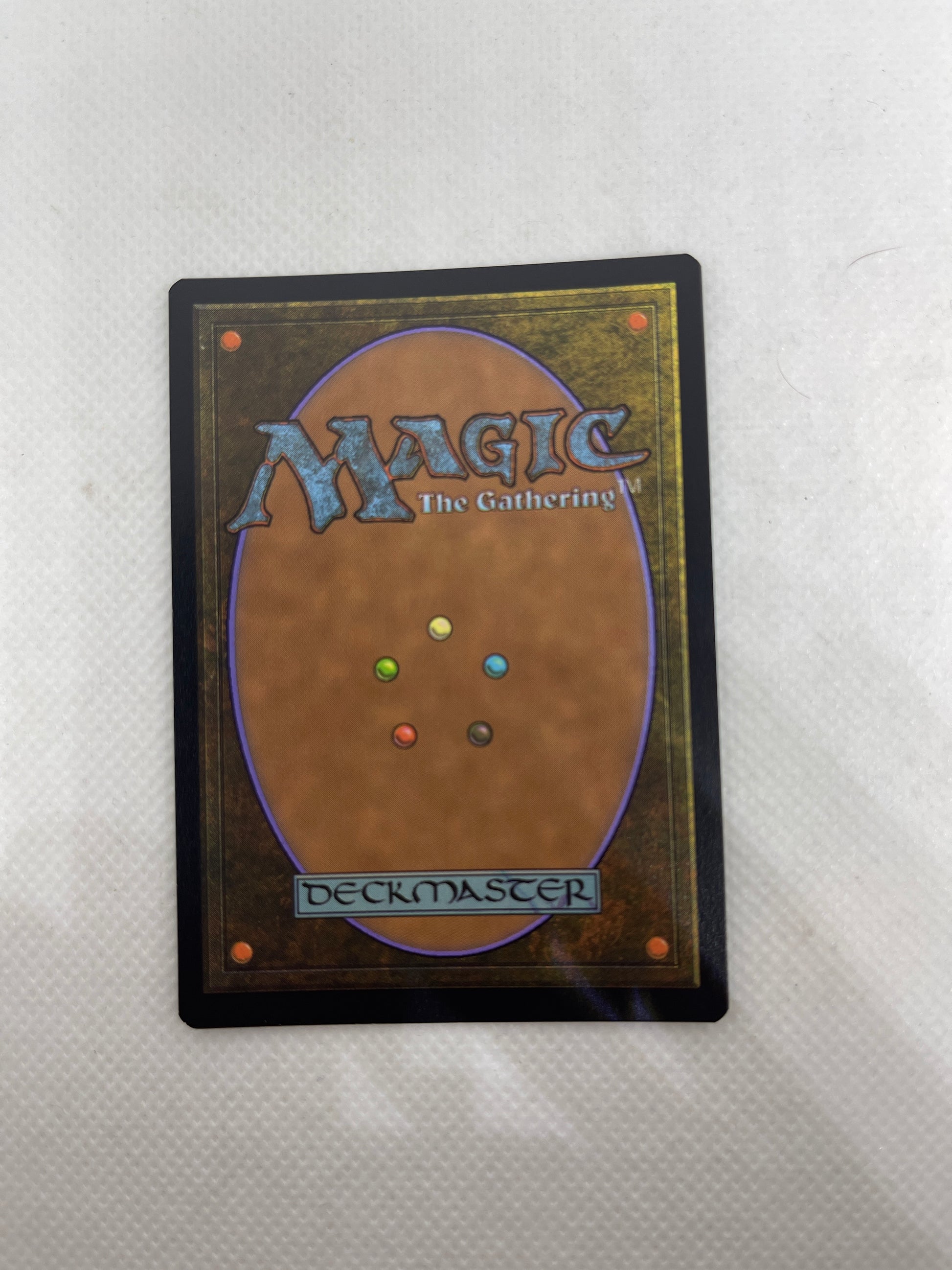 Trading card from 'Magic: The Gathering' on a textured white surface