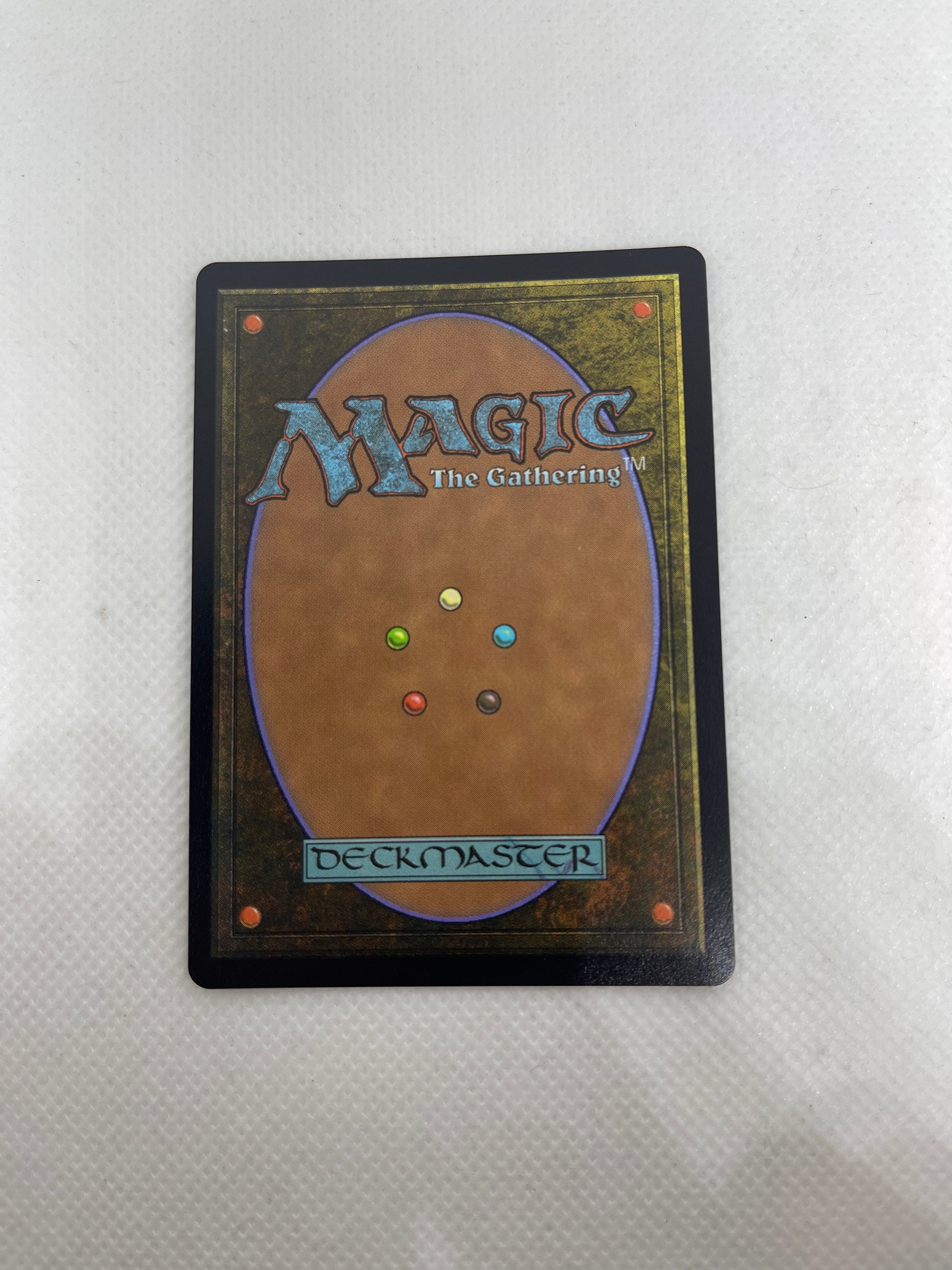 Trading card from 'Magic: The Gathering' on a textured white surface