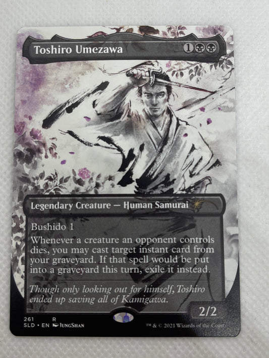 Trading card with artistic design on a textured gray surface