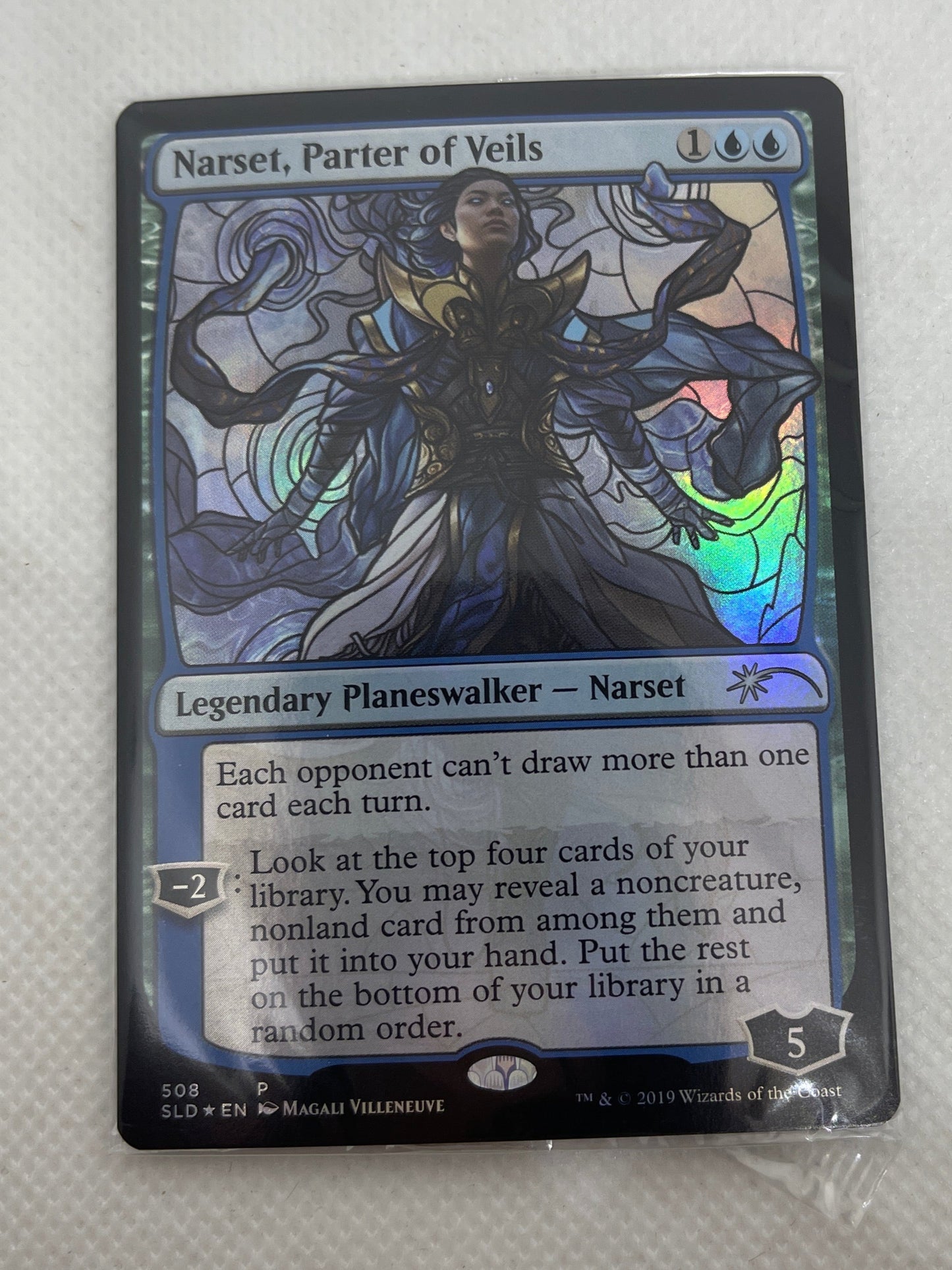 Trading card with a character illustration on a white surface