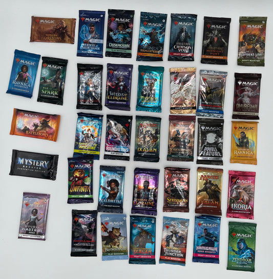 Collection of small booklets or cards with various covers on a white surface