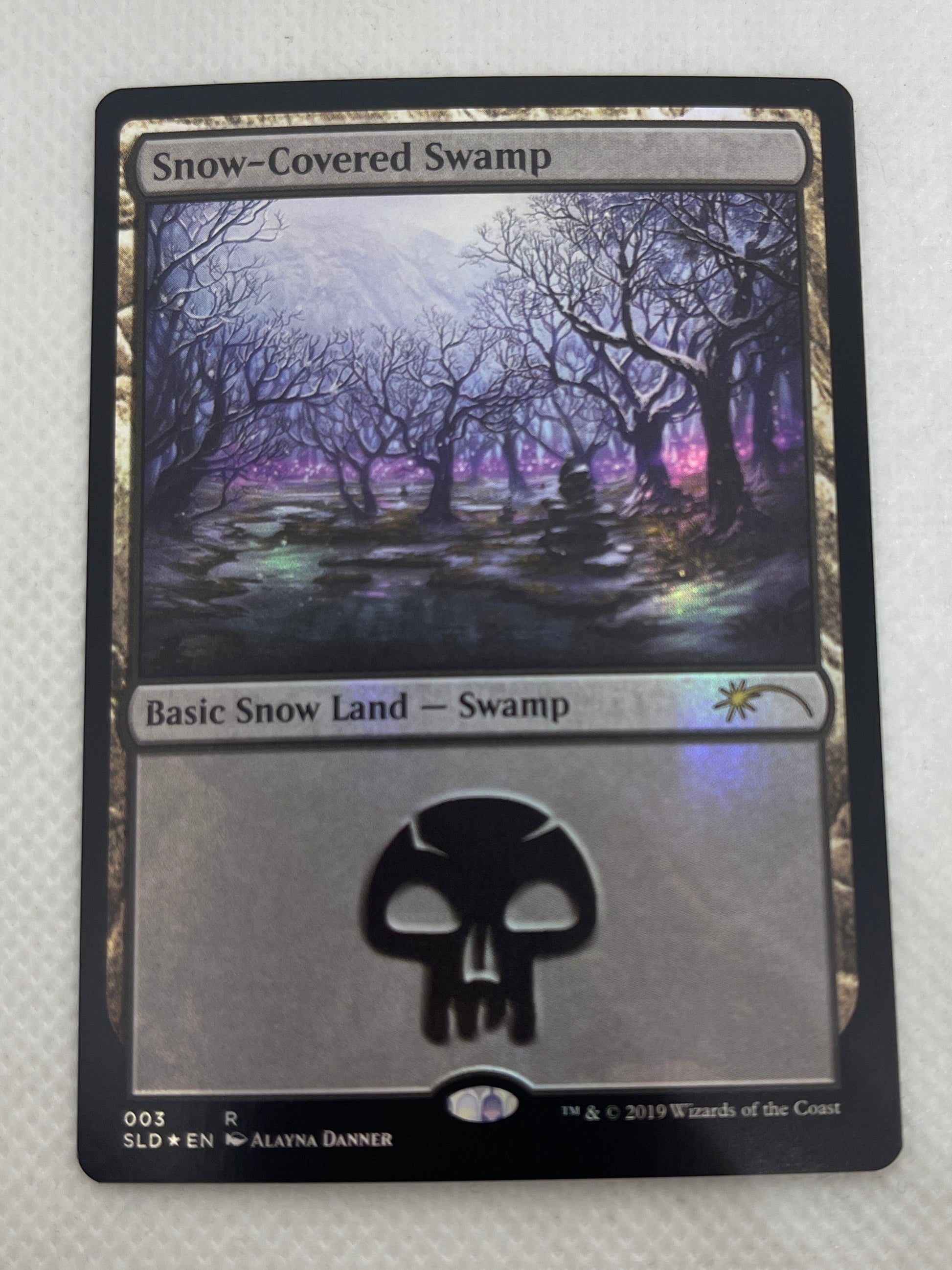 Card with a black border and central design on a white background