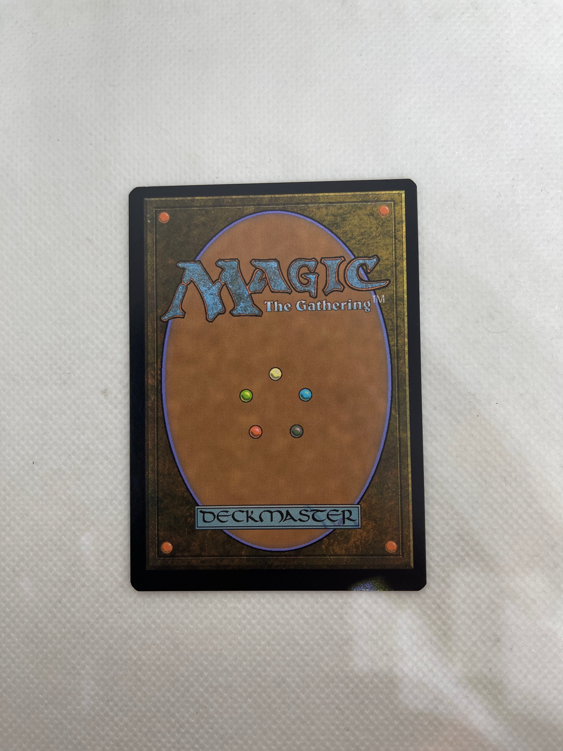 Card with 'Magic: The Gathering' branding on a textured white background