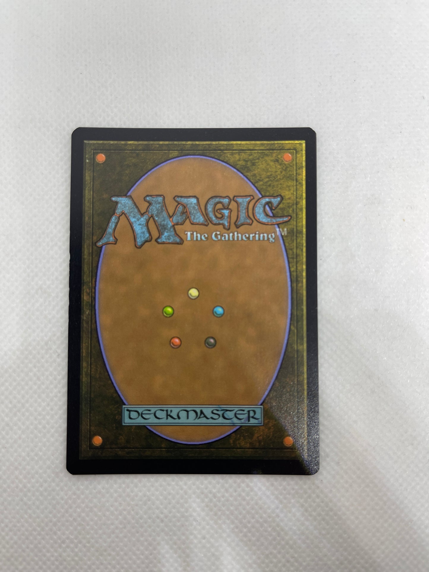 Trading card with 'Magic: The Gathering' branding on a textured gray background