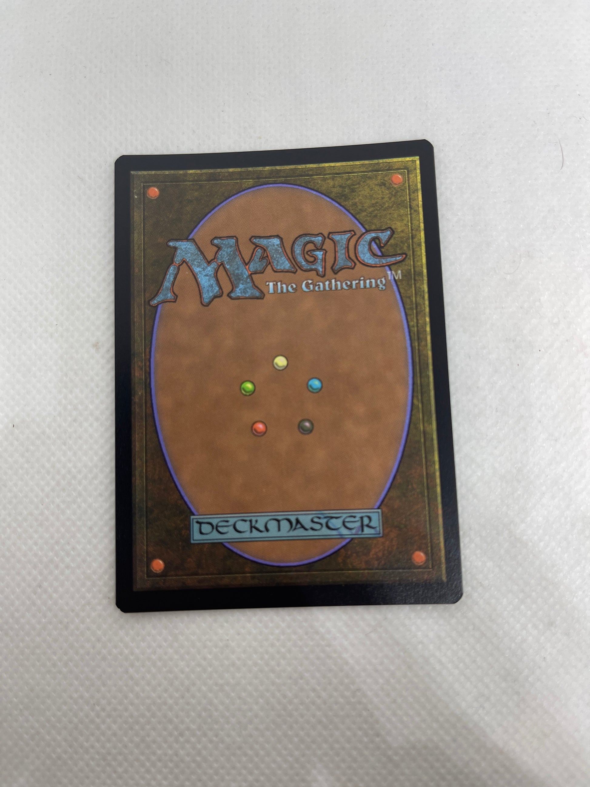 Trading card with 'Magic: The Gathering' branding on a textured surface