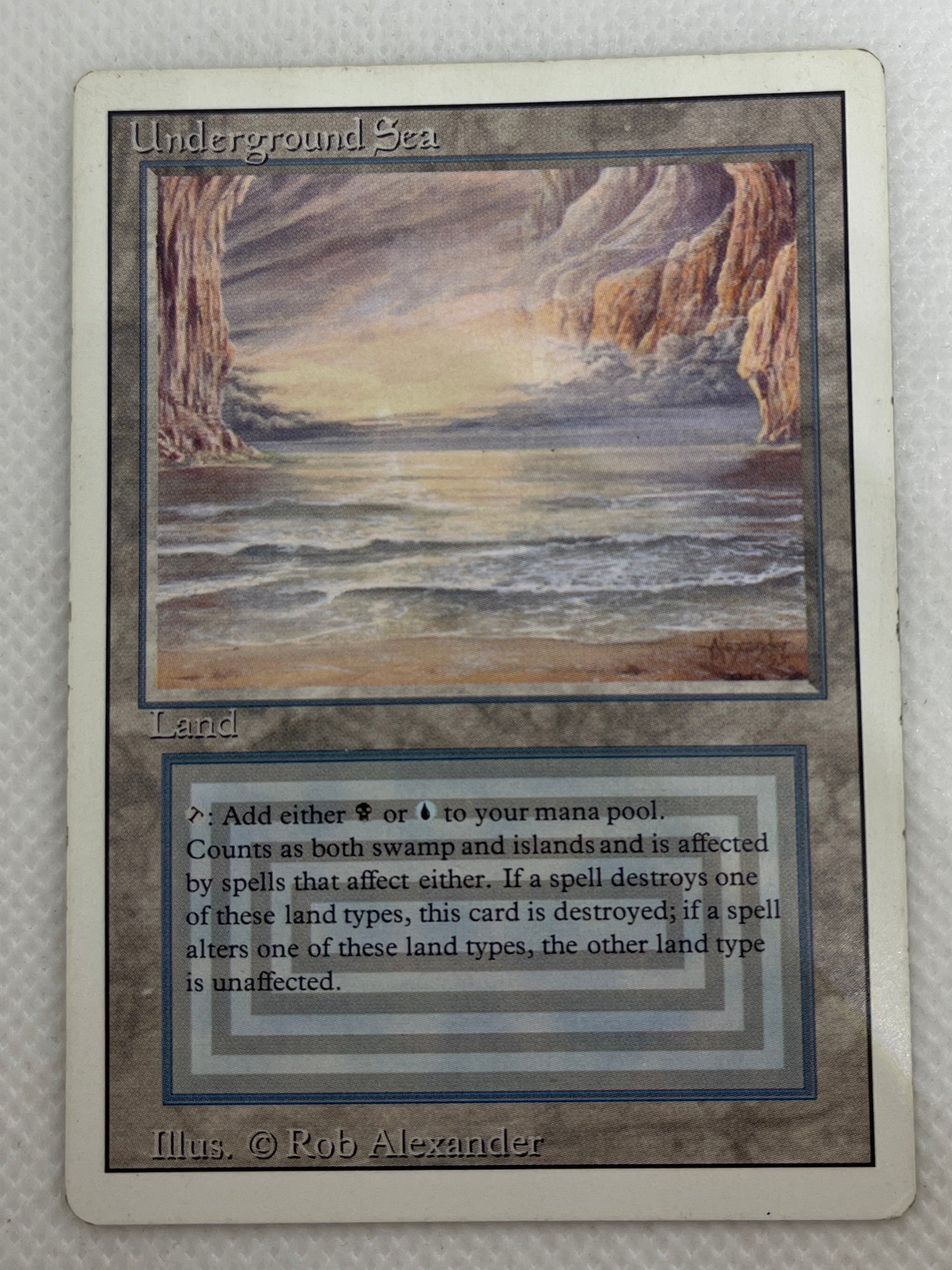 Vintage-style card with a scenic illustration and text on a textured surface
