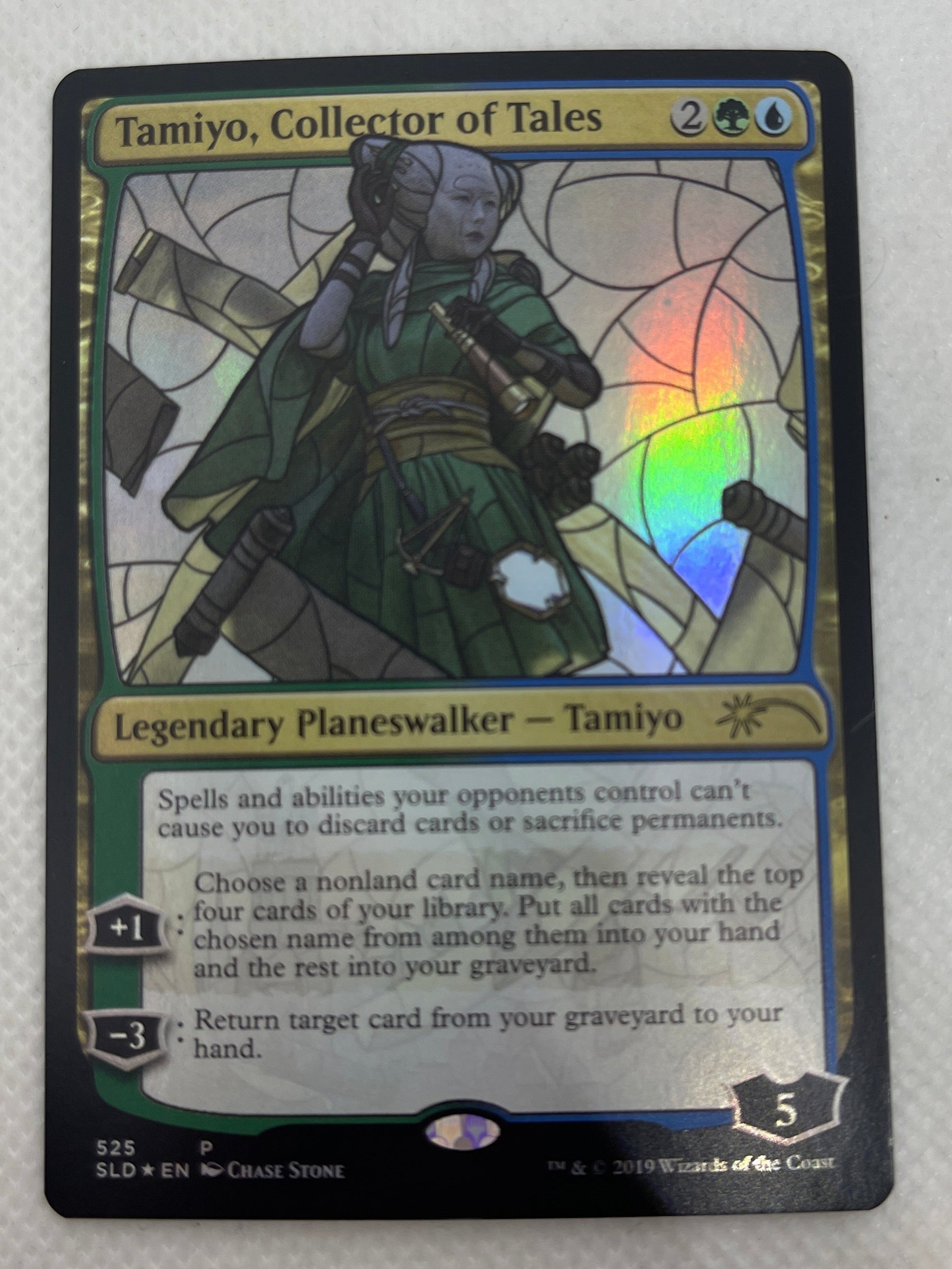 Card featuring a character in a fantasy setting on a white background
