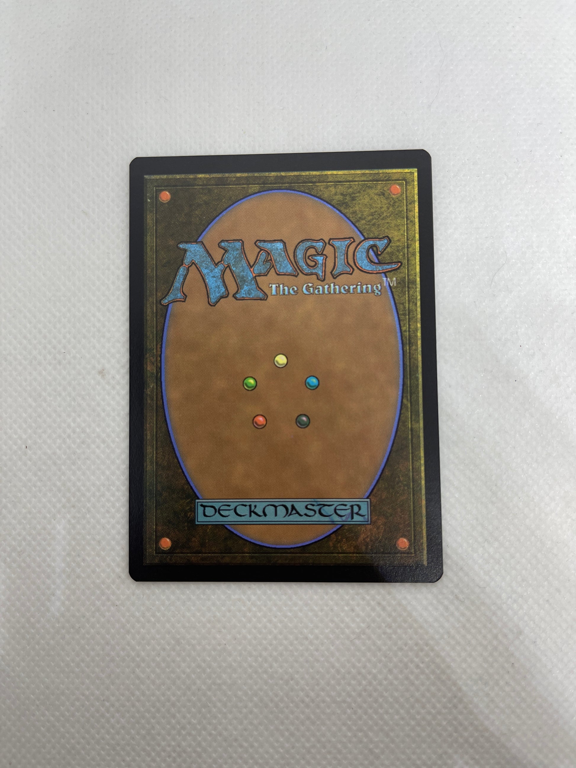 Trading card from 'Magic: The Gathering' on a textured surface