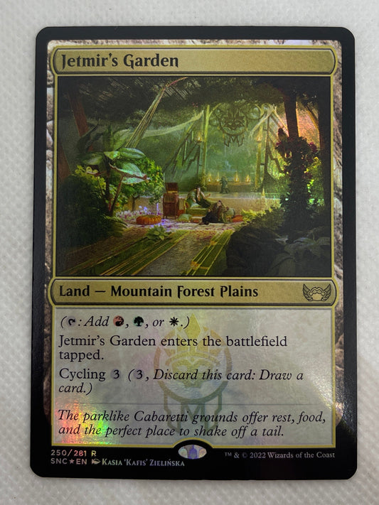 Card with green landscape design on a white surface