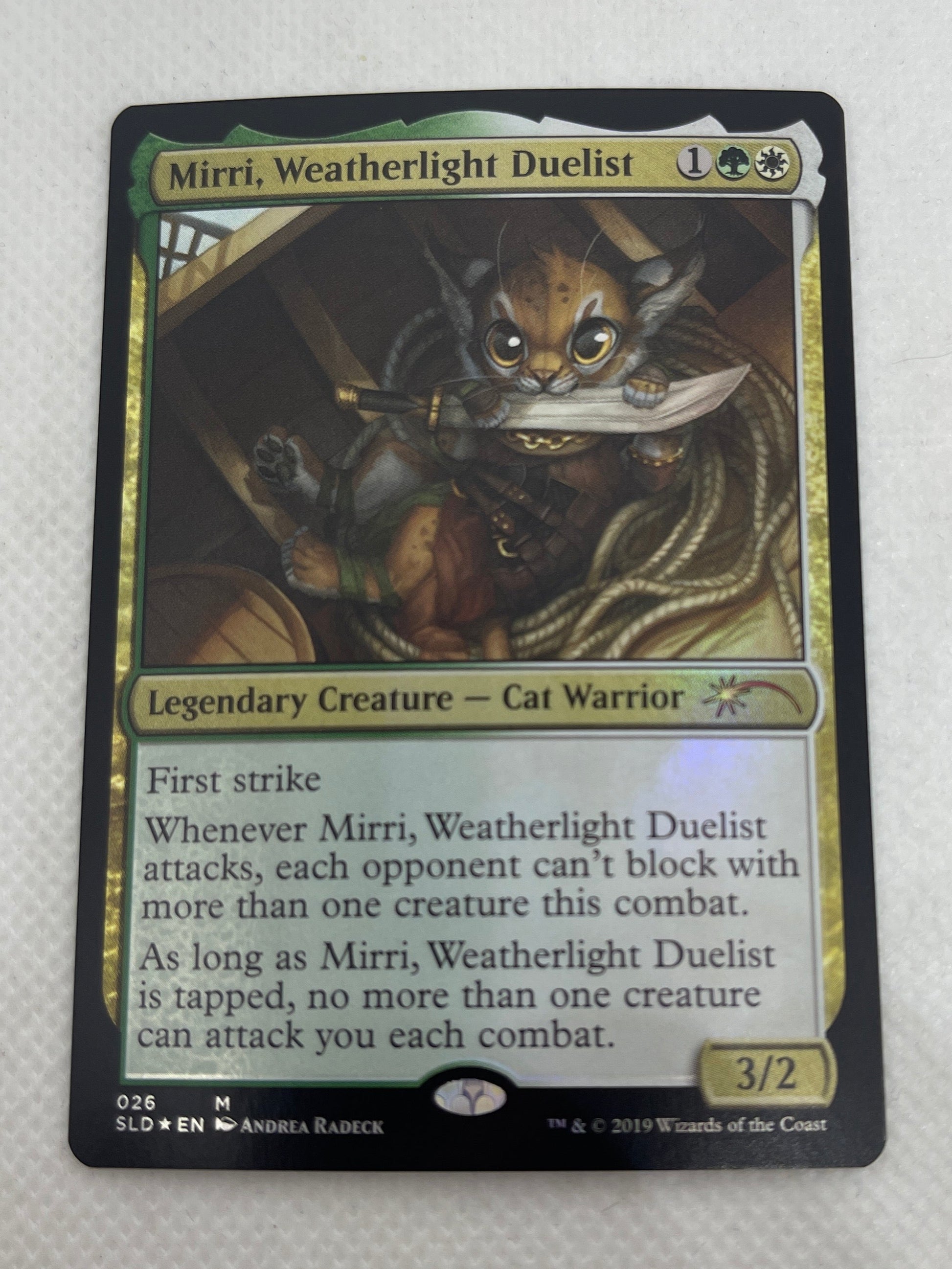 Card featuring a cat with game text on a white background