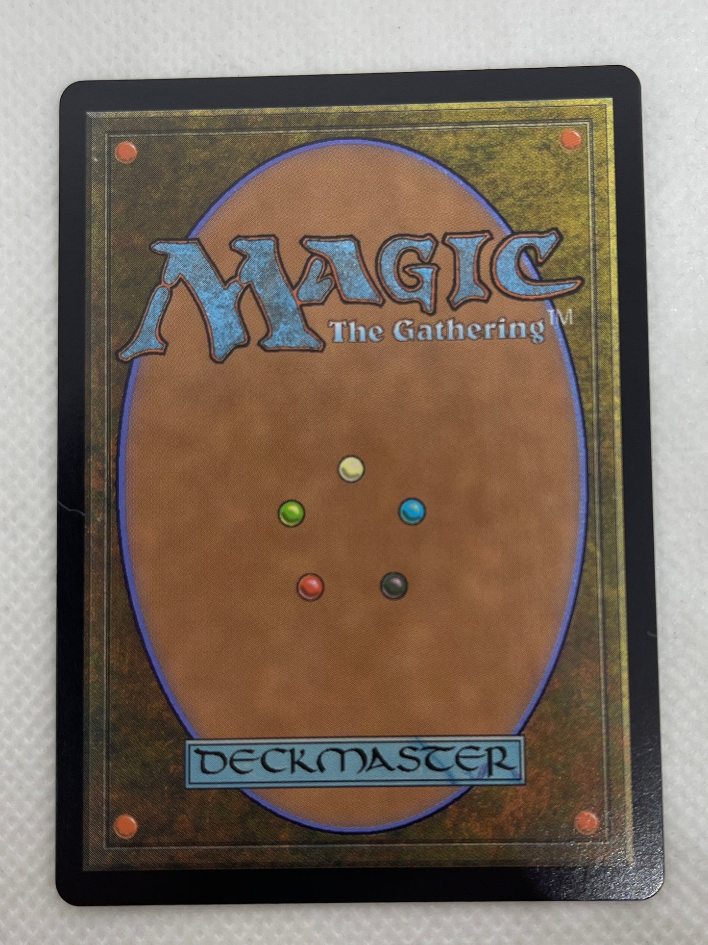 Trading card with 'Magic: The Gathering' branding on a textured surface