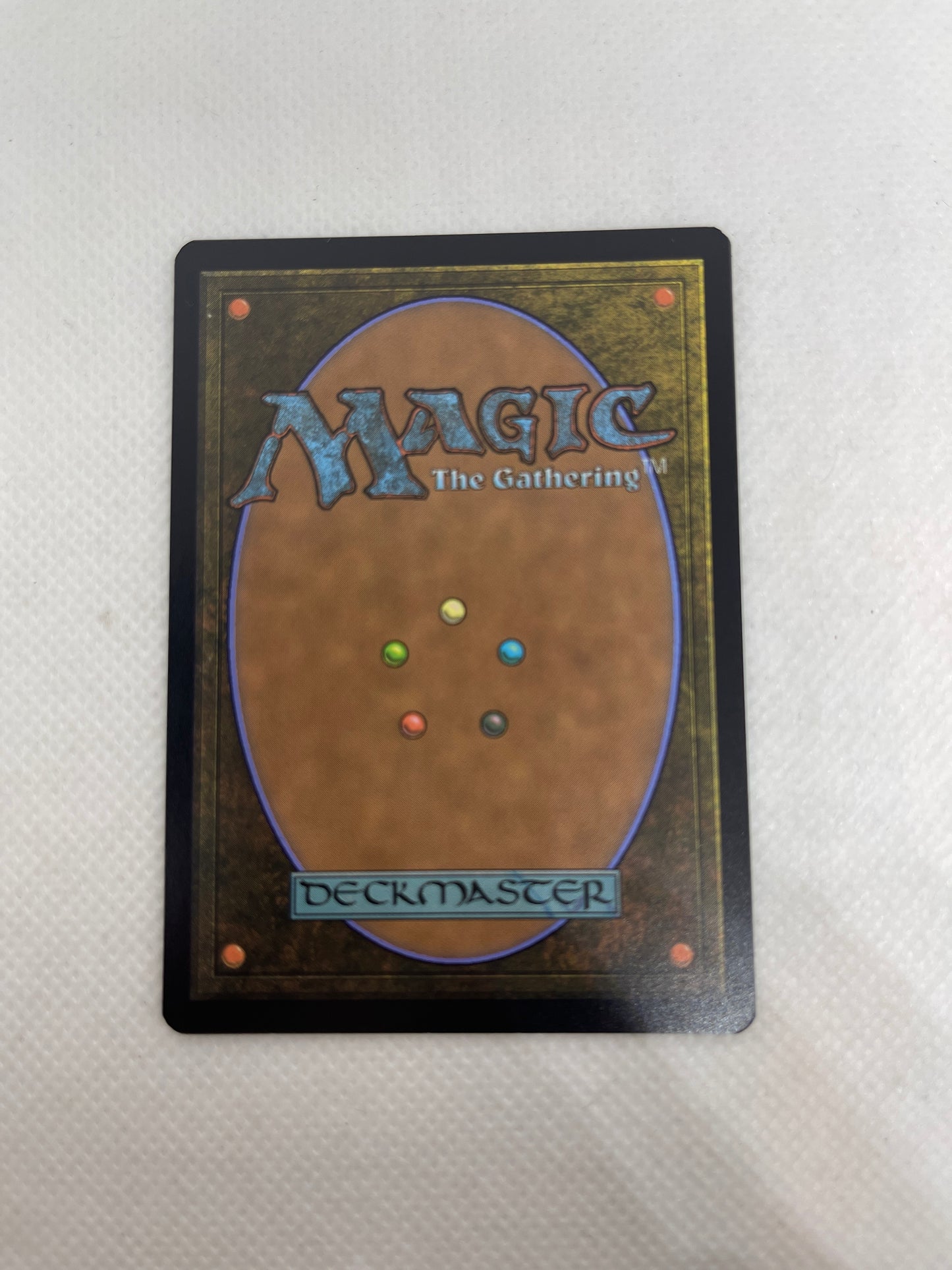 Trading card with 'Magic: The Gathering' branding on a textured surface