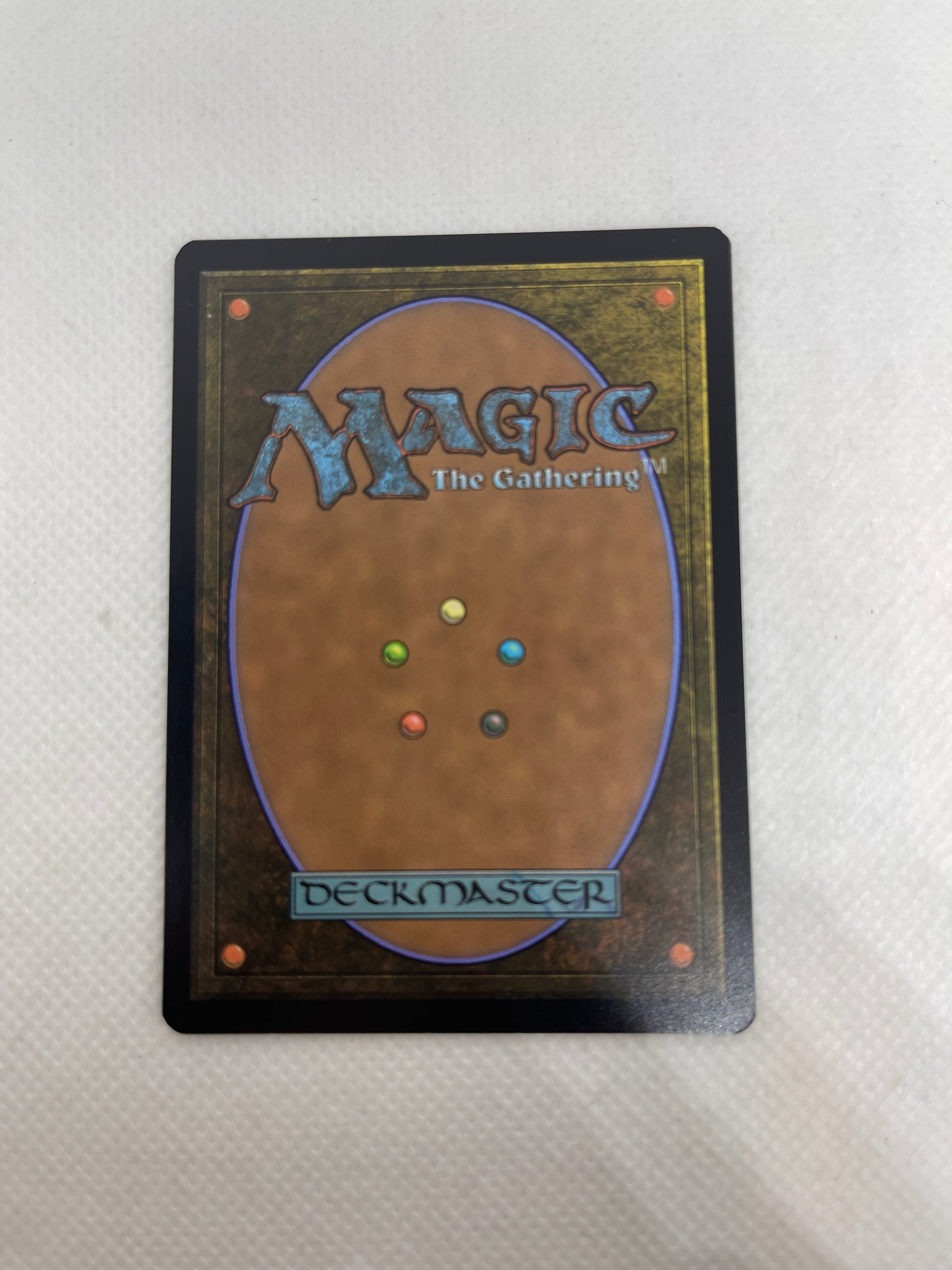 Trading card with 'Magic: The Gathering' branding on a textured surface