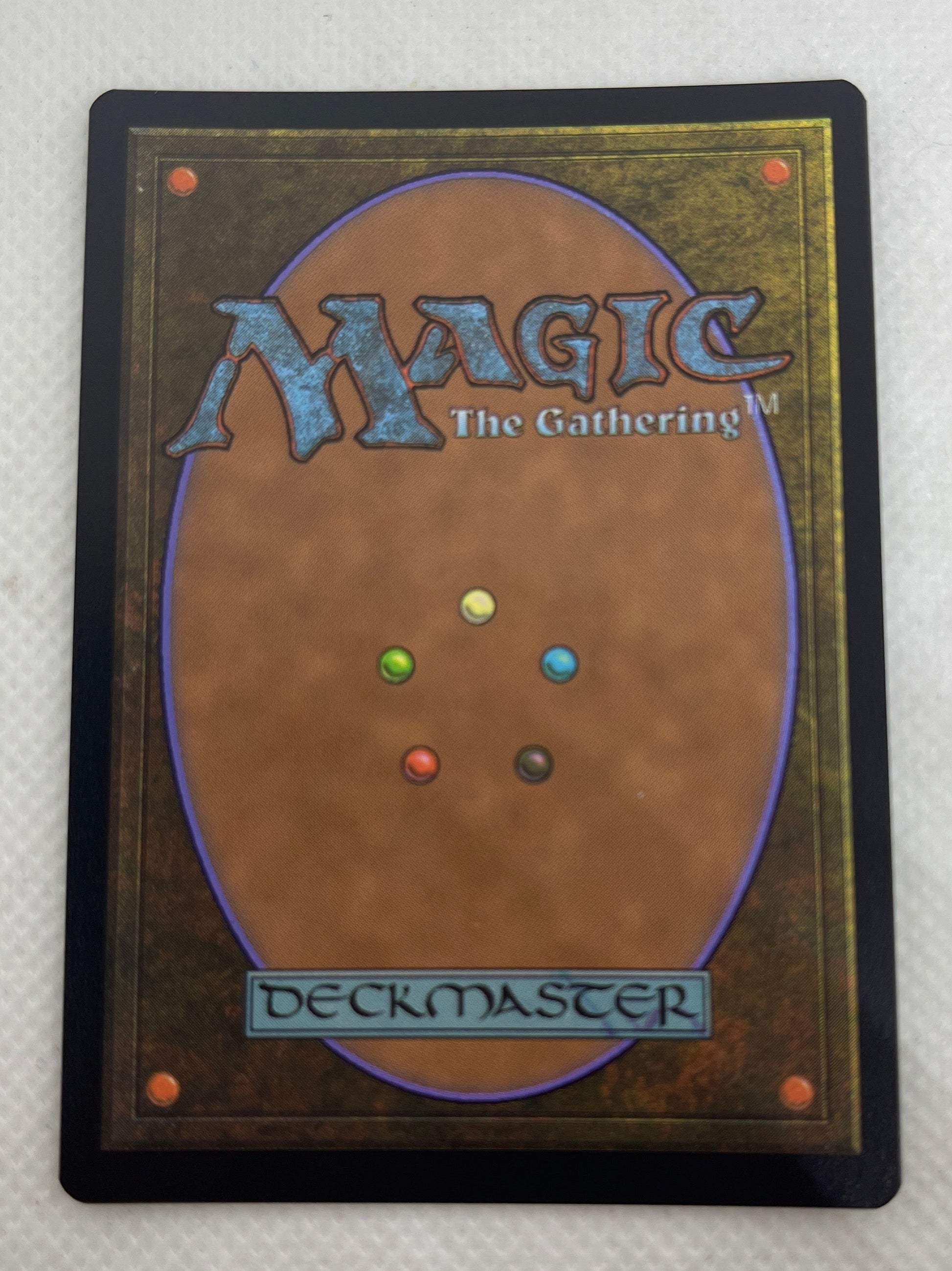 Trading card with 'Magic: The Gathering' branding on a textured surface