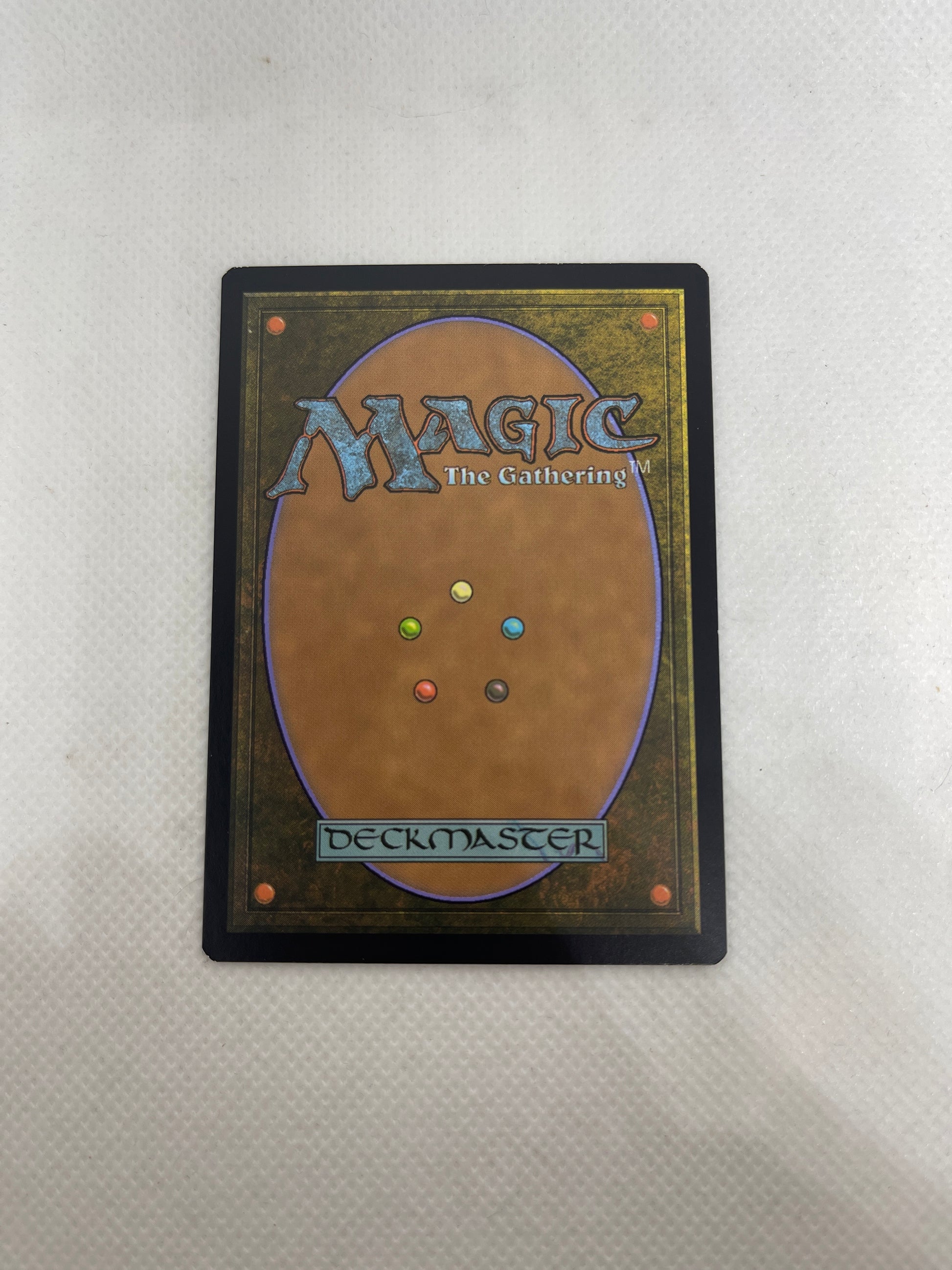 Trading card with 'Magic: The Gathering' branding on a textured surface