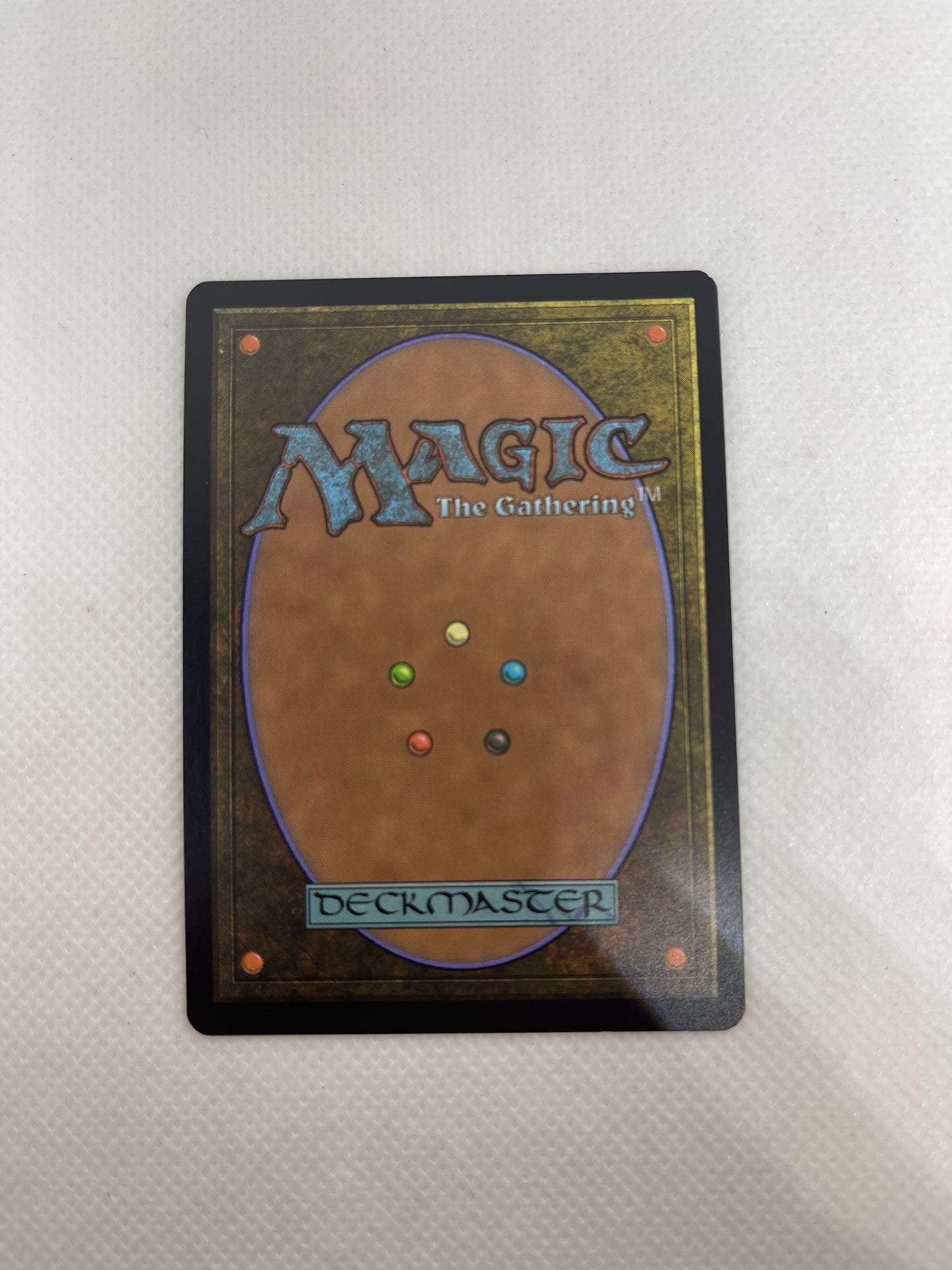 Magic: The Gathering card on a textured surface