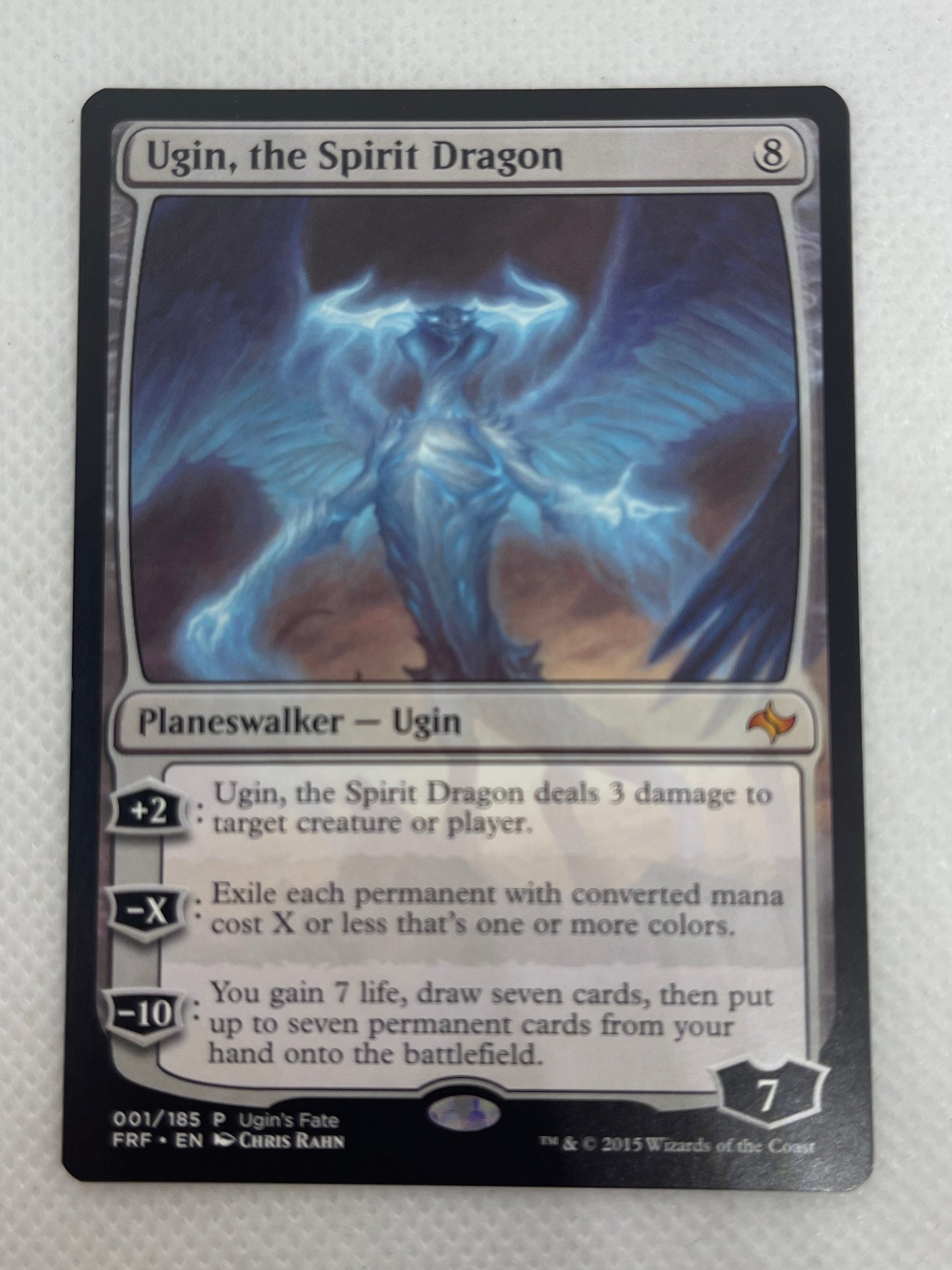 Trading card featuring a dragon on a white background