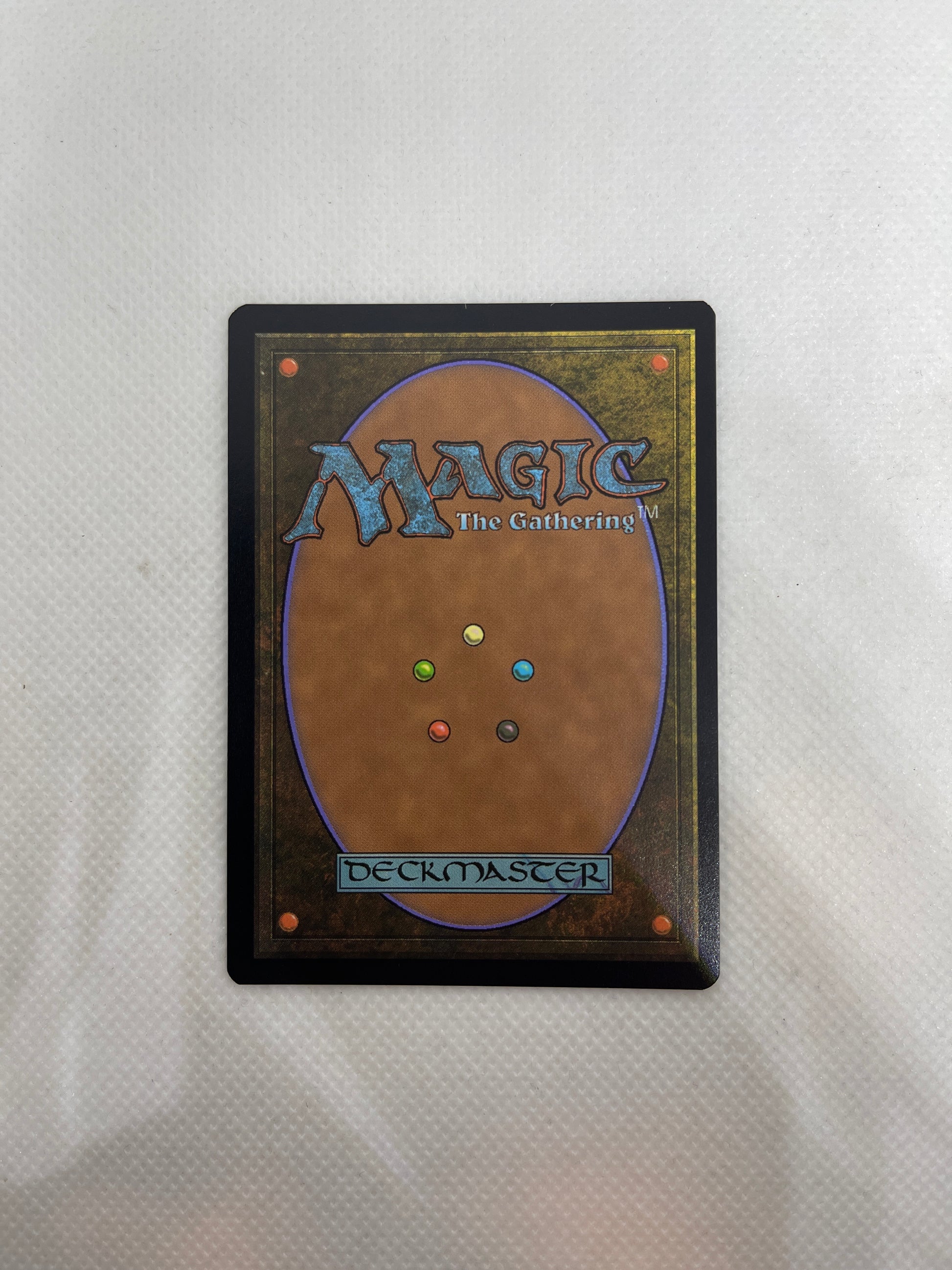 Trading card from 'Magic: The Gathering' on a textured white surface