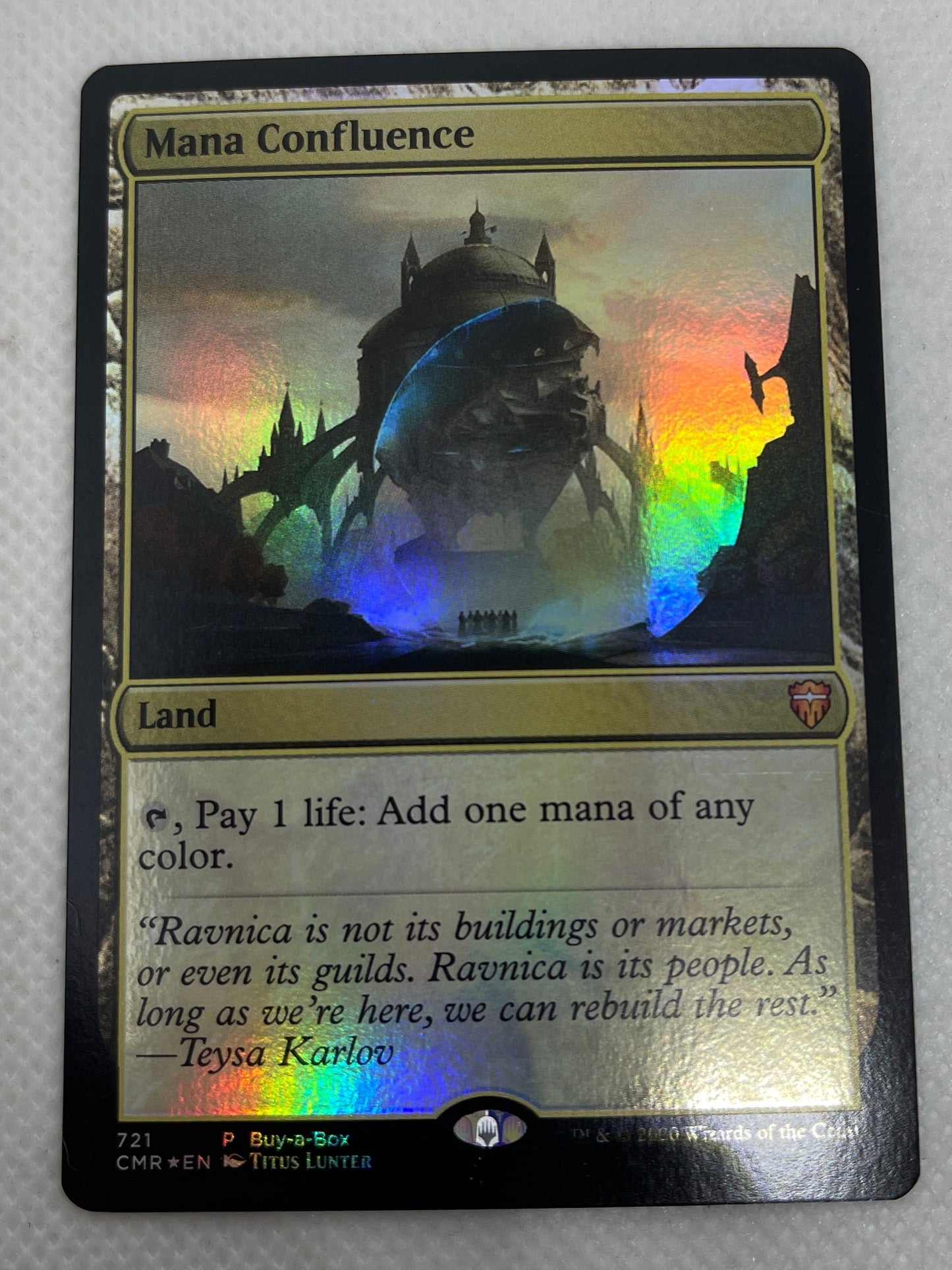 Trading card with colorful foil text on a gray background