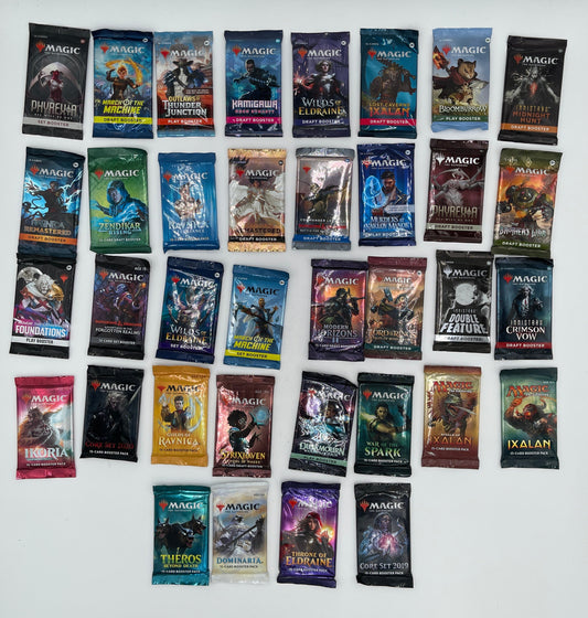 Collection of small booklets or cards with various covers arranged on a white surface.