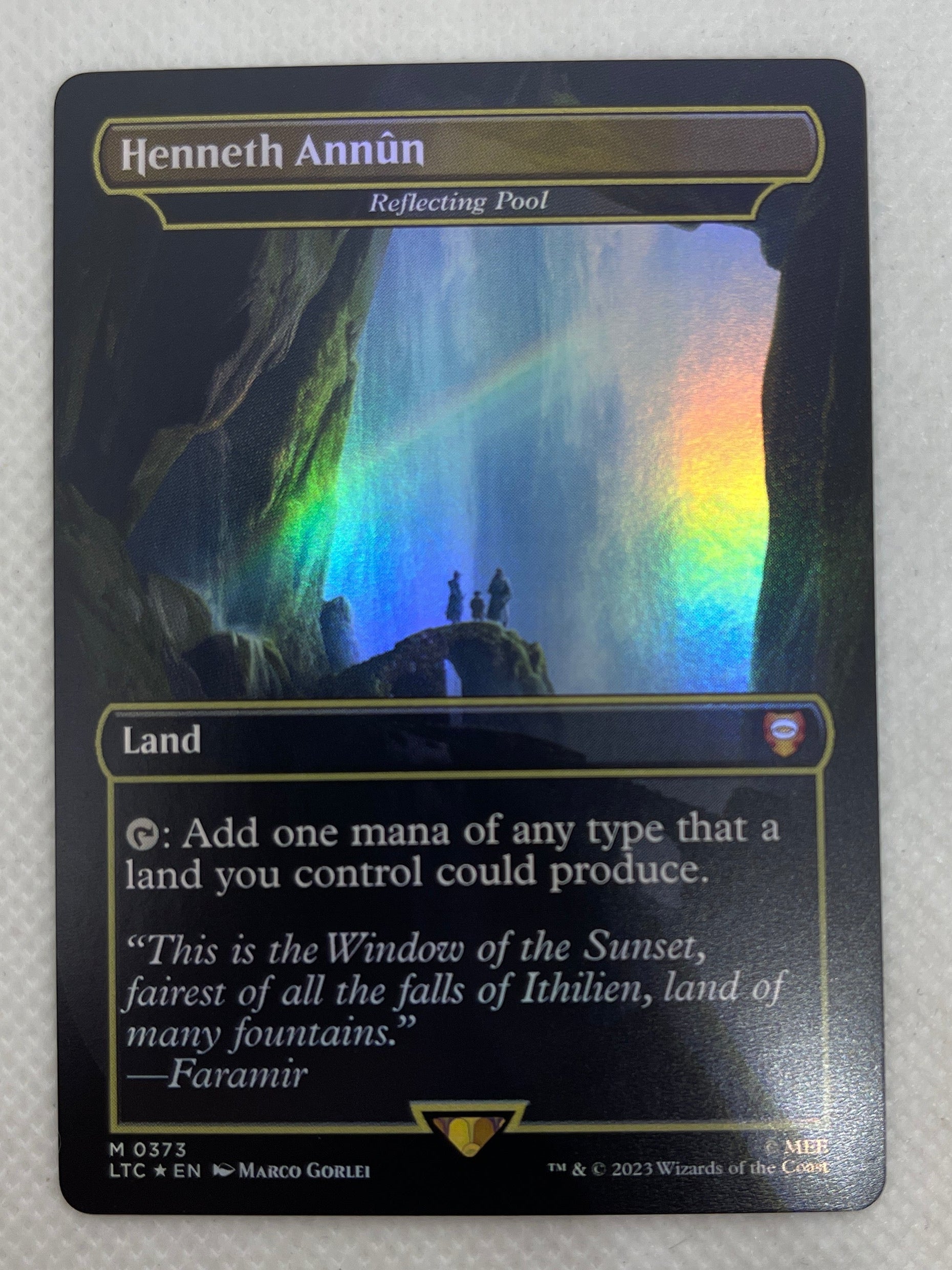Card with a colorful landscape on a gray surface