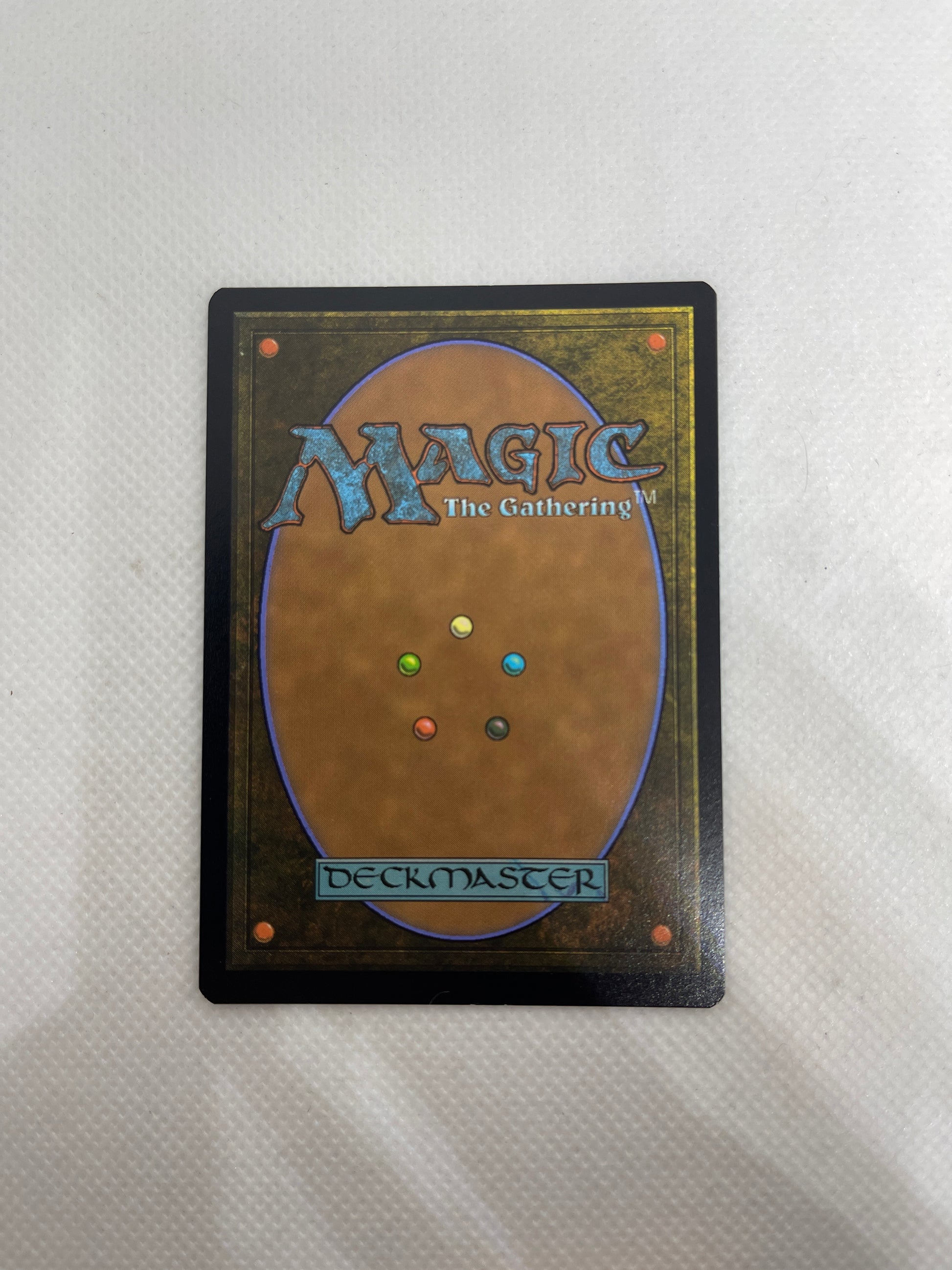 Trading card from 'Magic: The Gathering' on a textured surface