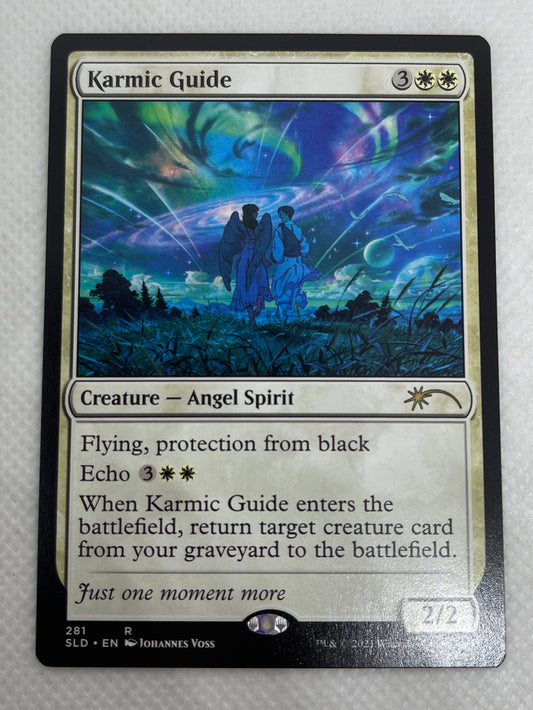 Trading card with colorful artwork on a metallic surface